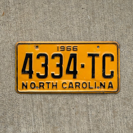 Photo of a 1966 North Carolina Truck License Plate Auto Tag Garage Decor Vintage 4334 TC with original patina