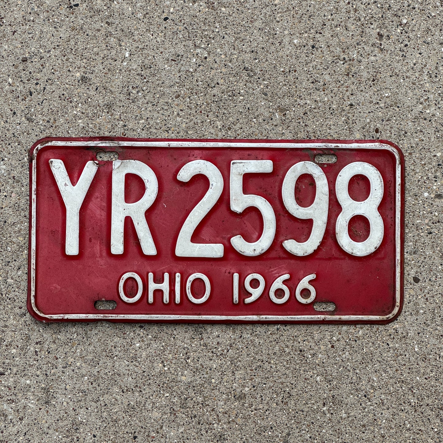 Photo of a 1966 Ohio License Plate Auto Tag 2 Vintage Garage YR 2598 with original patina