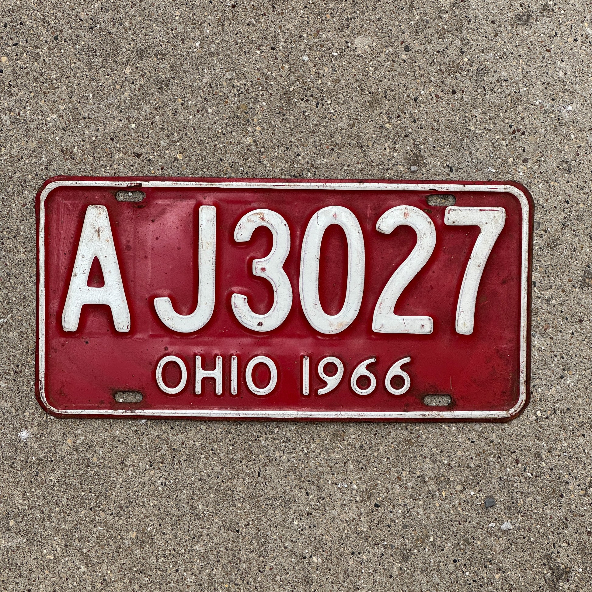 Photo of a 1966 Ohio License Plate Auto Tag Garage Decor Vintage AJ 3027 with original patina