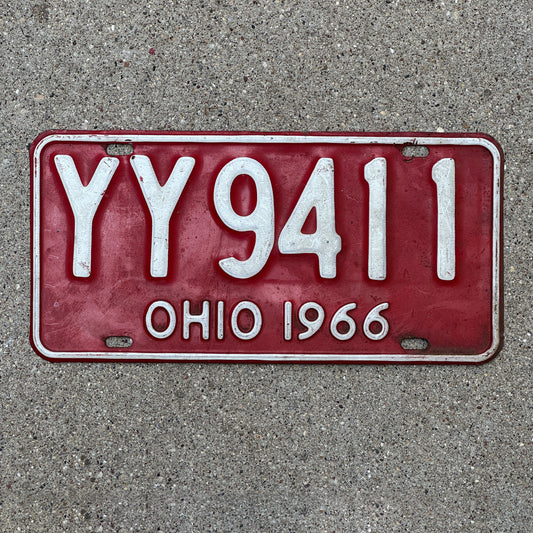 Photo of a 1966 Ohio License Plate Auto Tag Garage Decor Vintage YY 9411 with original patina