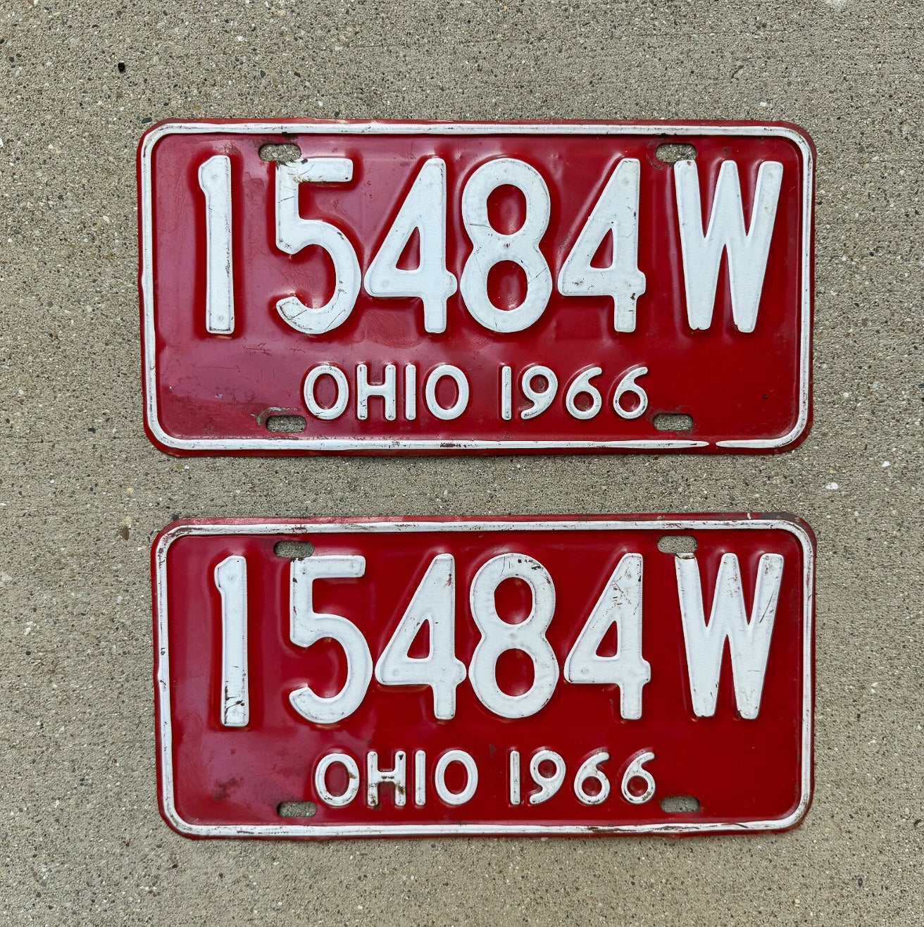 Photo of a 1966 Ohio License Plate Pair Auto Tag Garage Decor Vintage 15484 W with original patina