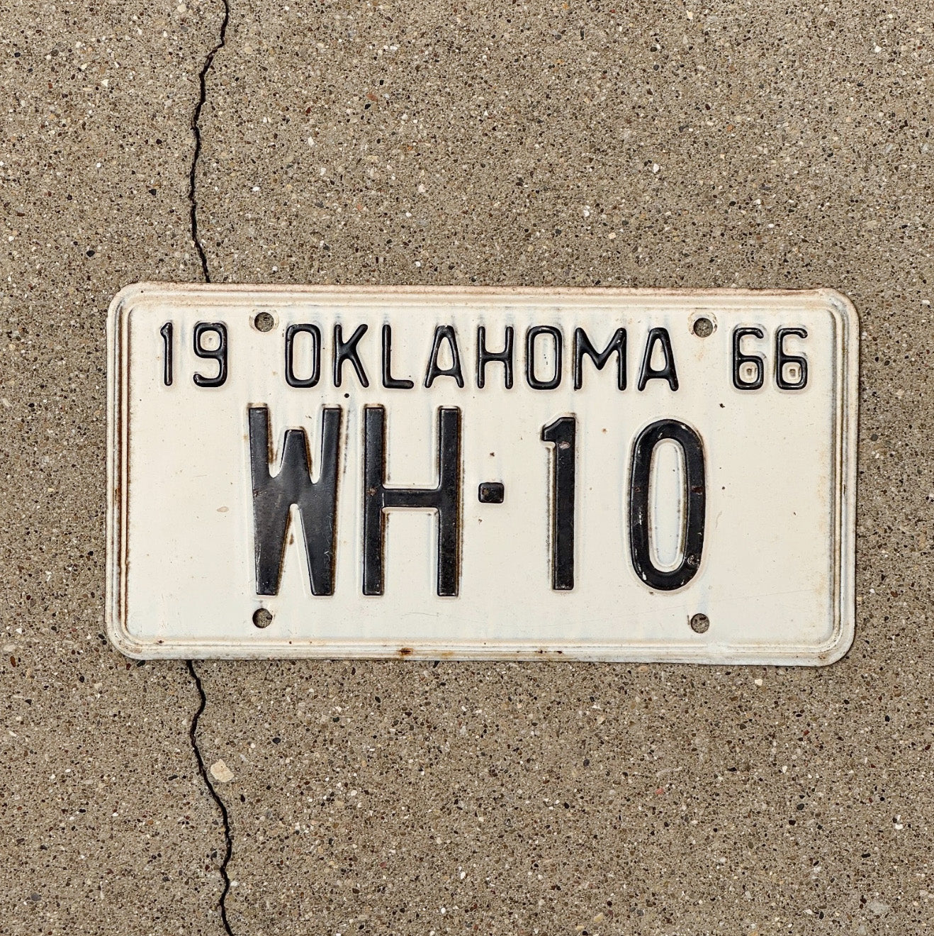 Photo of a 1966 Oklahoma License Plate Auto Tag Garage Decor Vintage Nice Number WH 10 with original patina