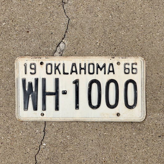 Photo of a 1966 Oklahoma License Plate Auto Tag Garage Decor Vintage Nice Number WH 1000 with original patina