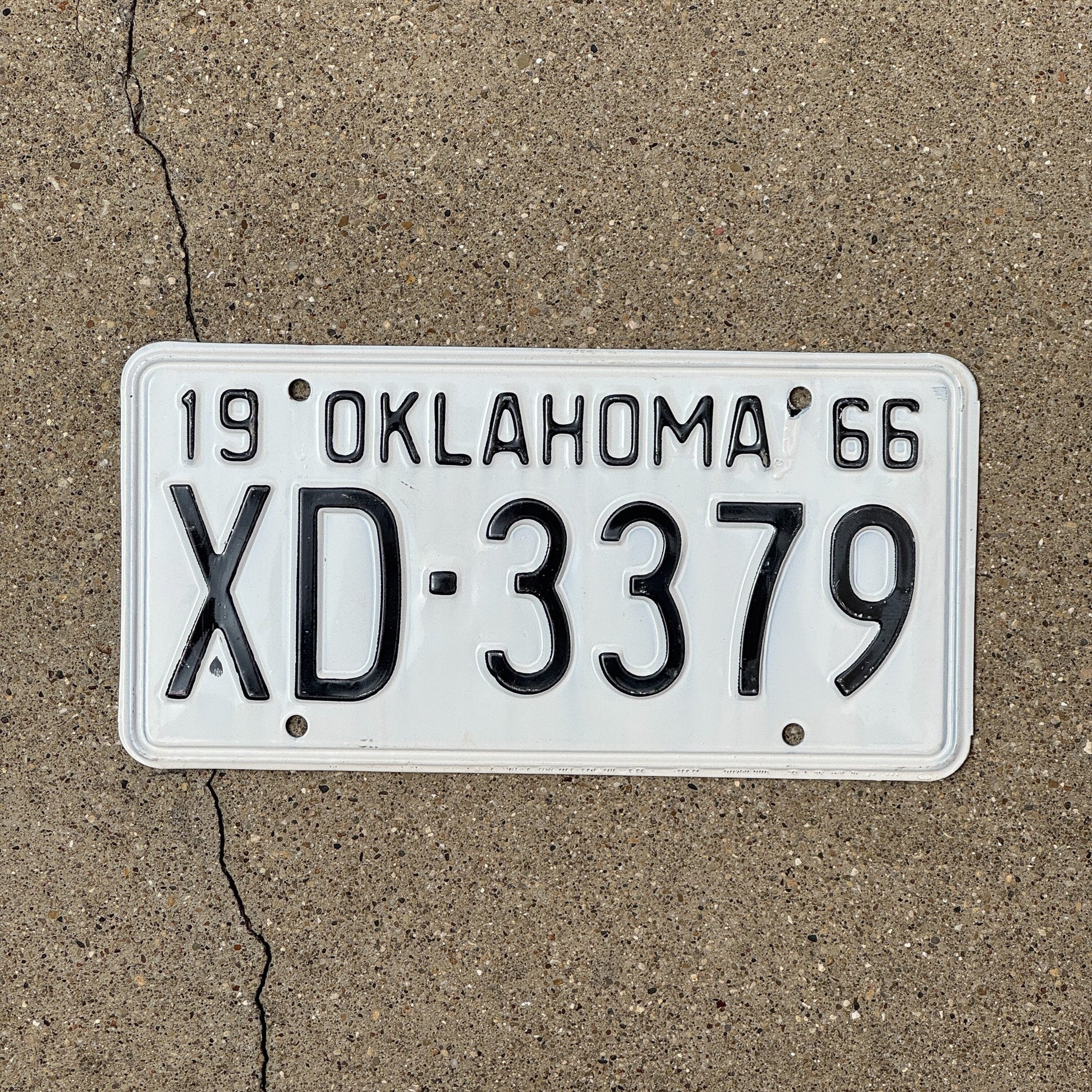 Photo of a 1966 Oklahoma License Plate Auto Tag Garage Decor Vintage XD 3379