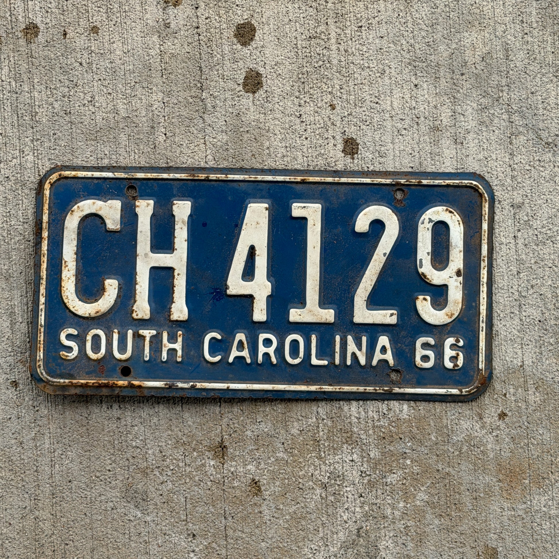 Photo of a 1966 South Carolina License Plate Auto Tag Garage Decor Vintage CH 4129 with original patina