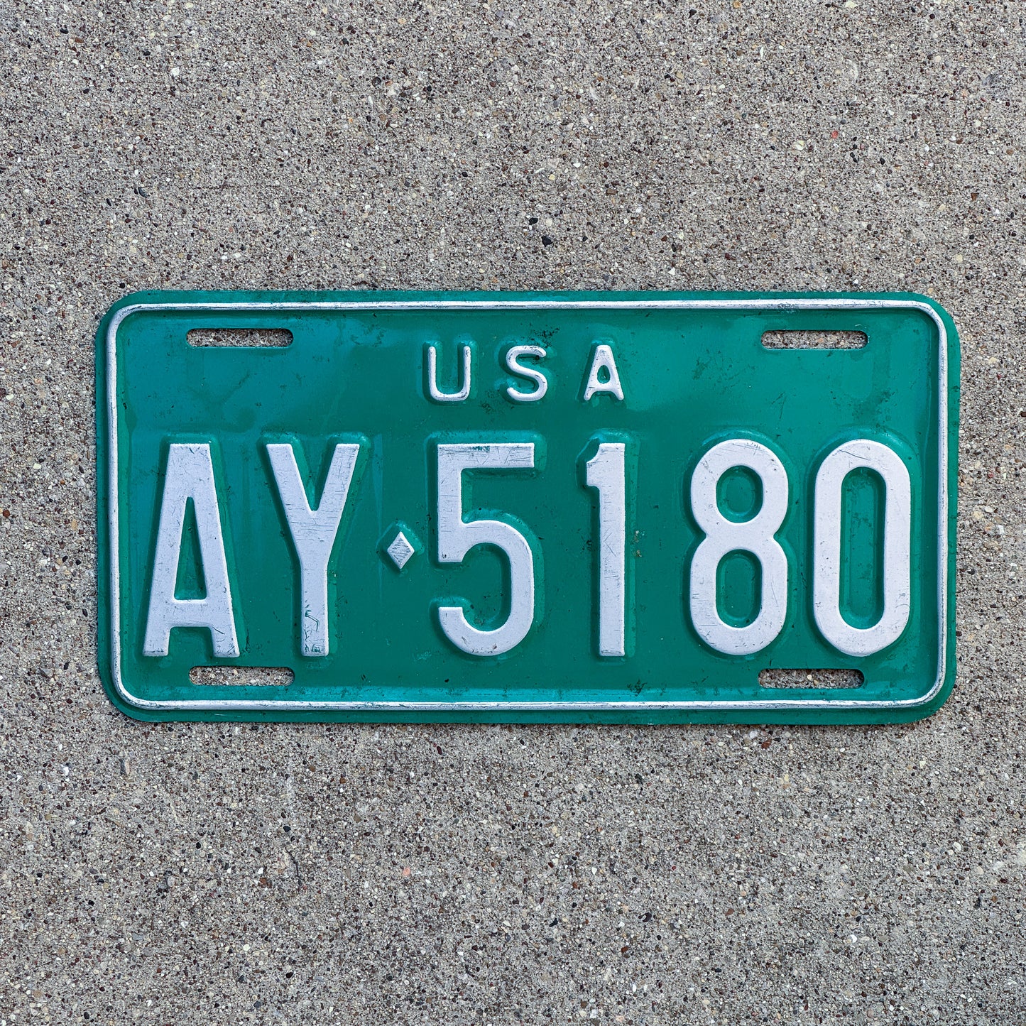 Photo of a 1966 US Forces Germany License Plate Auto Tag Garage Decor Vintage AY 5180 with original patina