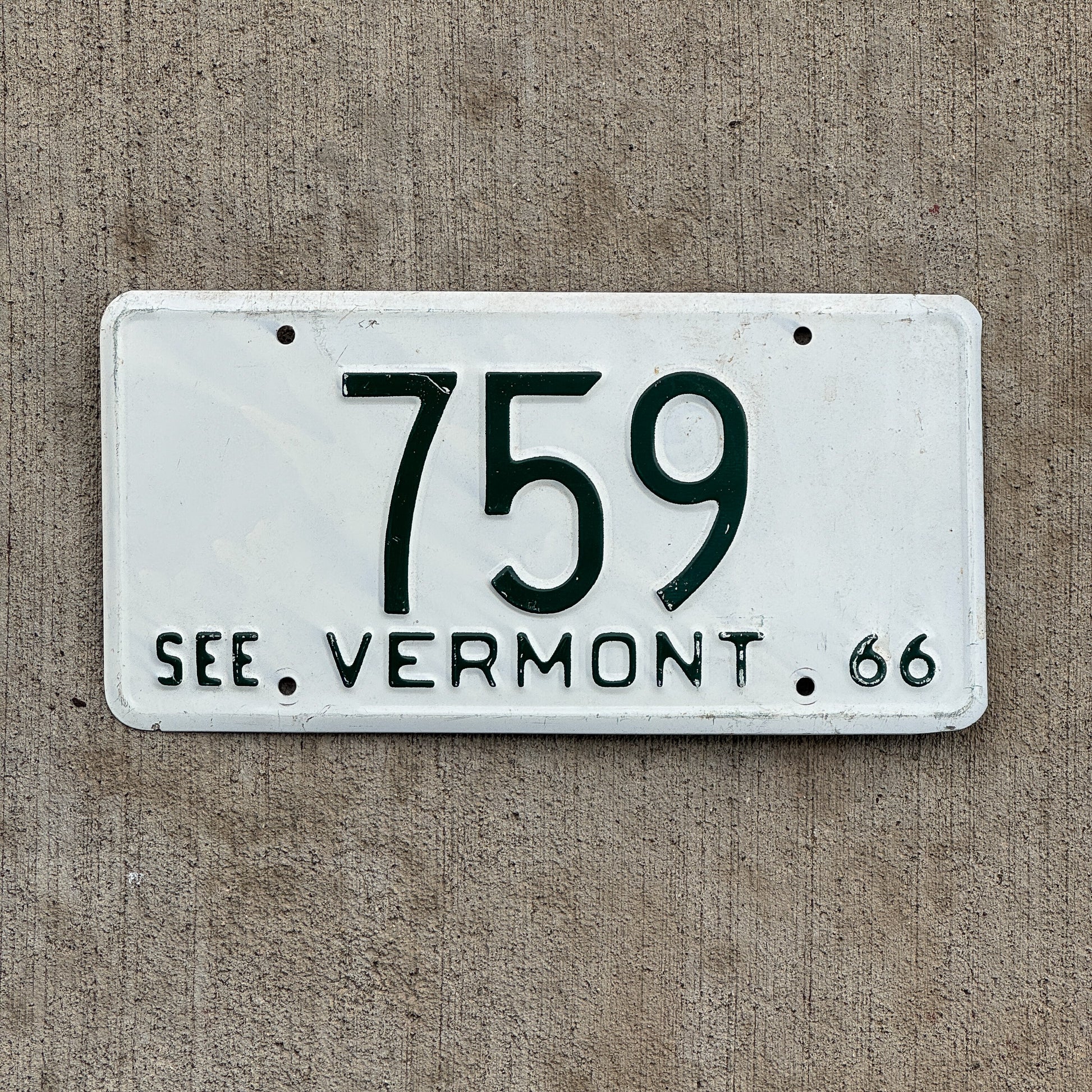 Photo of a 1966 Vermont License Plate Auto Tag Garage Decor Vintage Low Number Three Digit 759 with original patina
