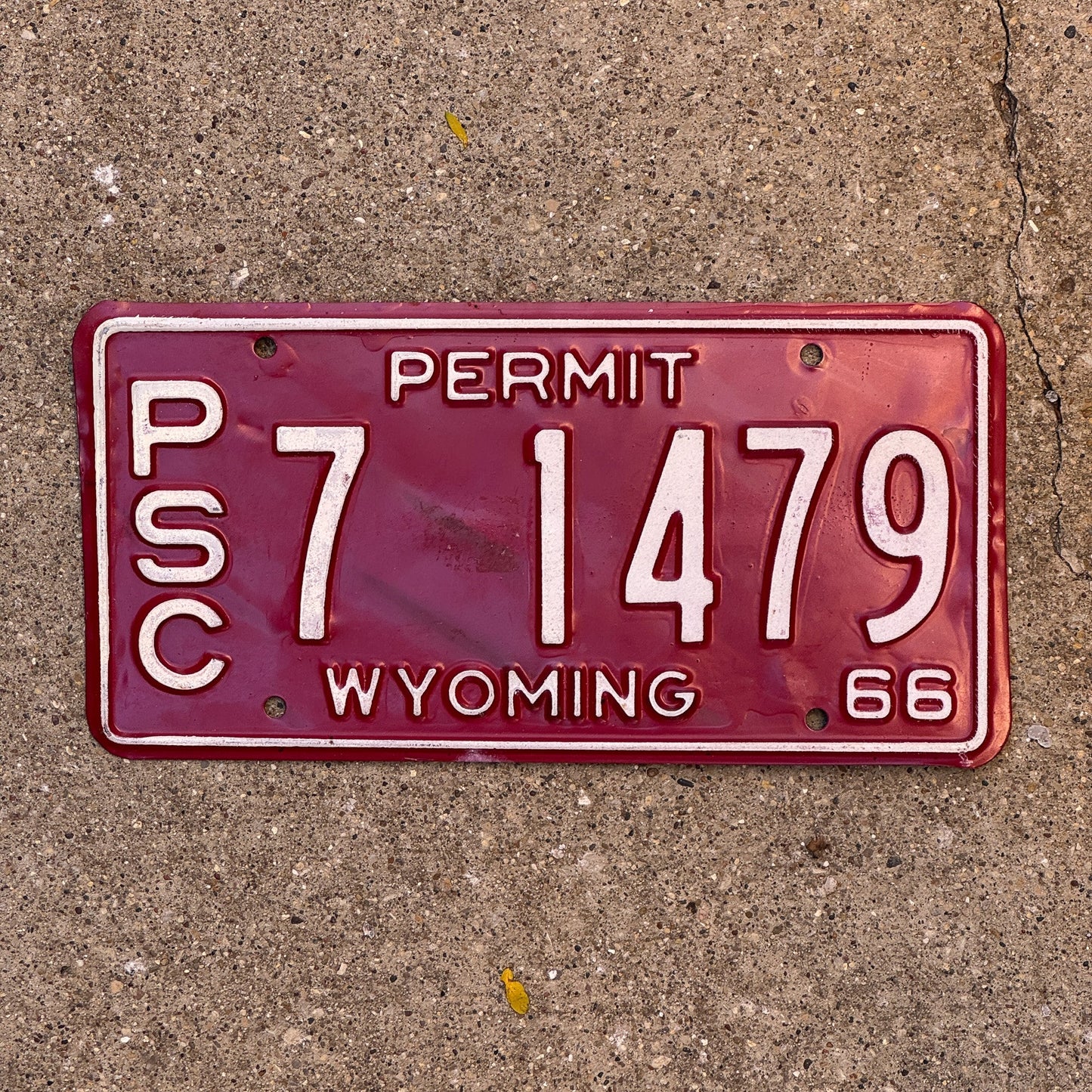 Photo of a 1966 Wyoming PSC Permit License Plate Auto Tag Garage Decor Vintage Public Service Commission 7 1479 with original patina