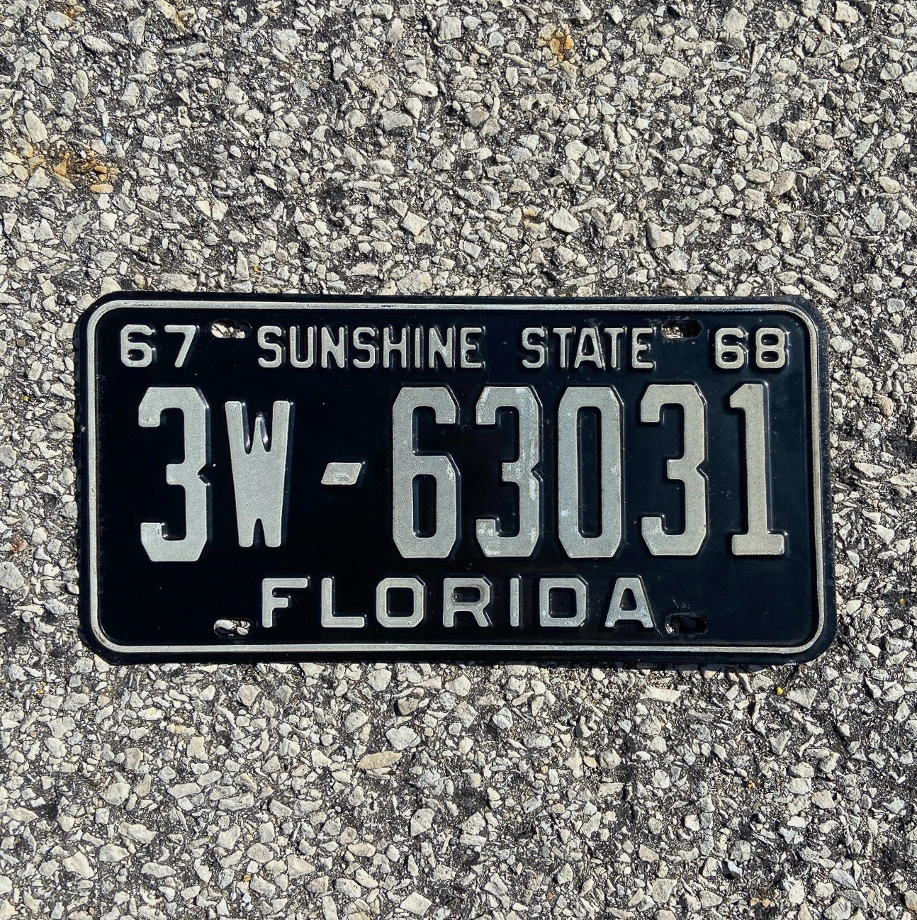 Photo of a 1967 1968 Florida License Plate Auto Tag Garage Decor Vintage Hillsborough County 3 W 63031 with original patina
