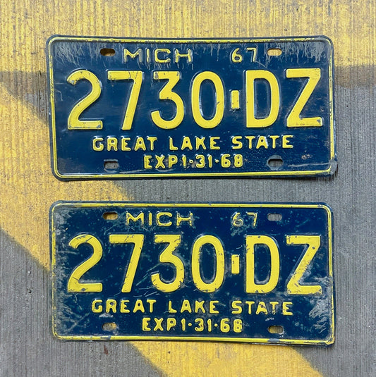 Photo of a 1967 1968 Michigan Truck License Plate Pair Auto Tag Garage Decor Vintage 2730 DZ with original patina