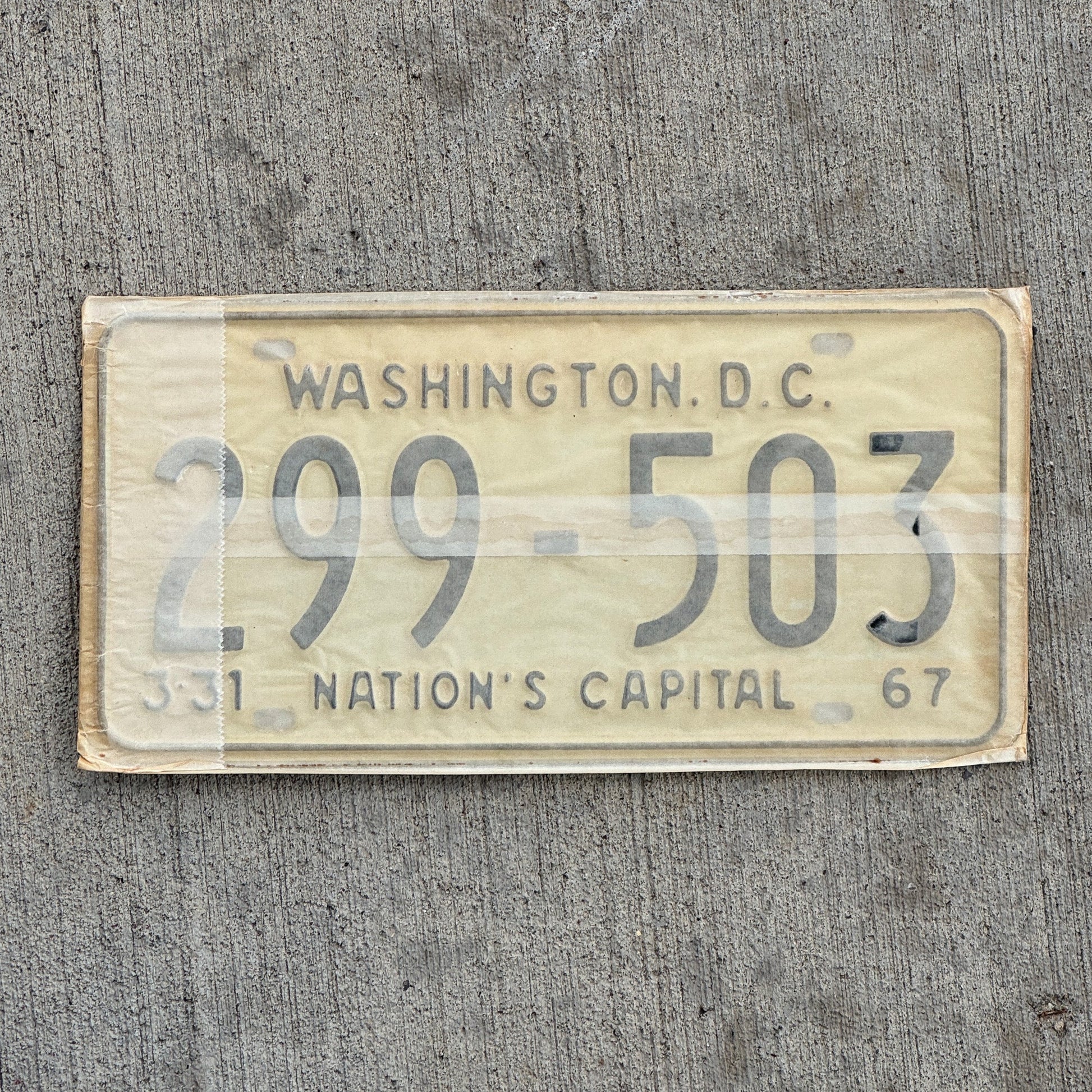 Photo of a 1967 1968 Washington DC License Plate Pair Auto Tag Garage Decor Vintage with Envelope 299 503 with original patina