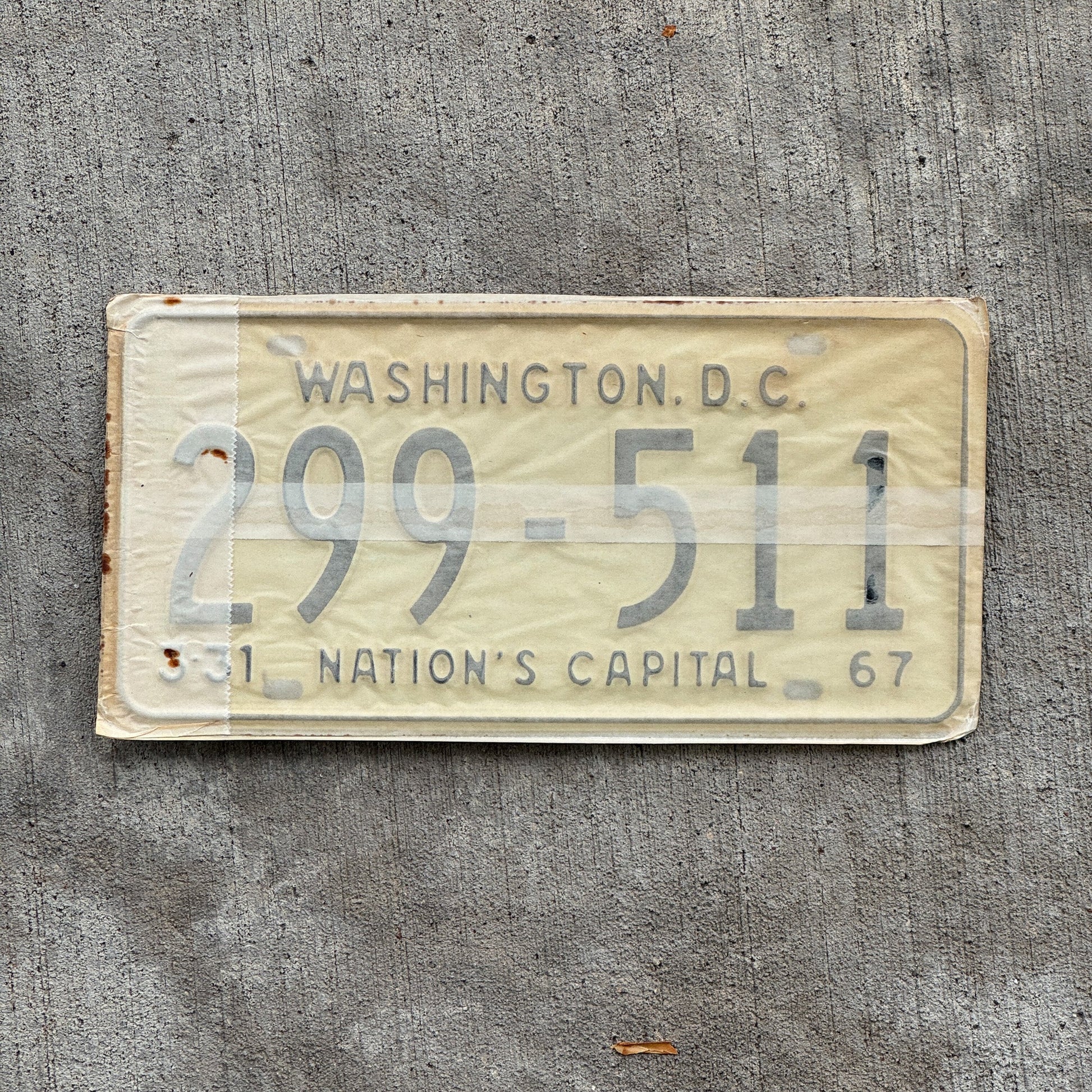 Photo of a 1967 1968 Washington DC License Plate Pair Auto Tag Garage Decor Vintage with Envelope 299 511 with original patina