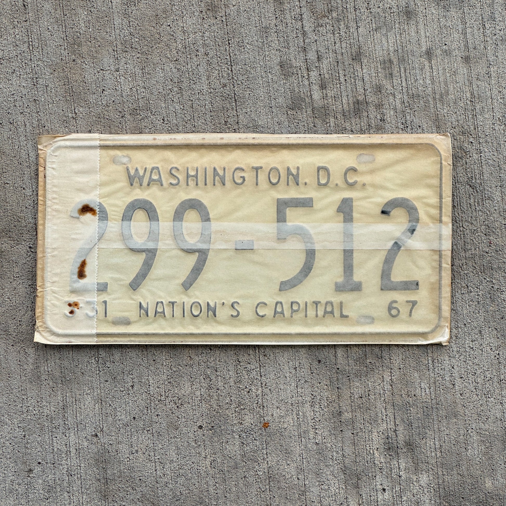 Photo of a 1967 1968 Washington DC License Plate Pair Auto Tag Garage Decor Vintage with Envelope 299 512 with original patina