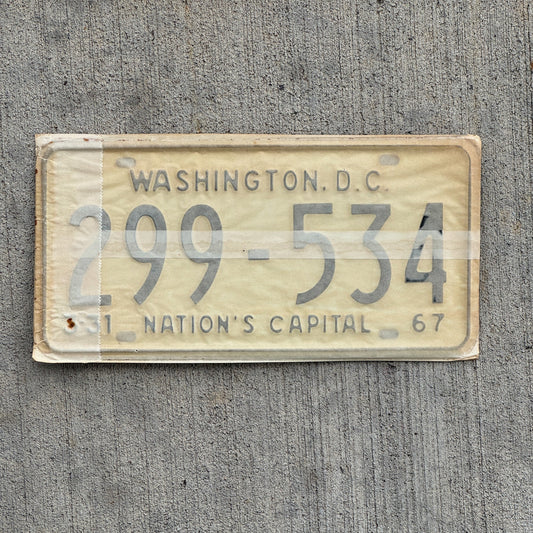Photo of a 1967 1968 Washington DC License Plate Pair Auto Tag Garage Decor Vintage with Envelope 299 534 with original patina