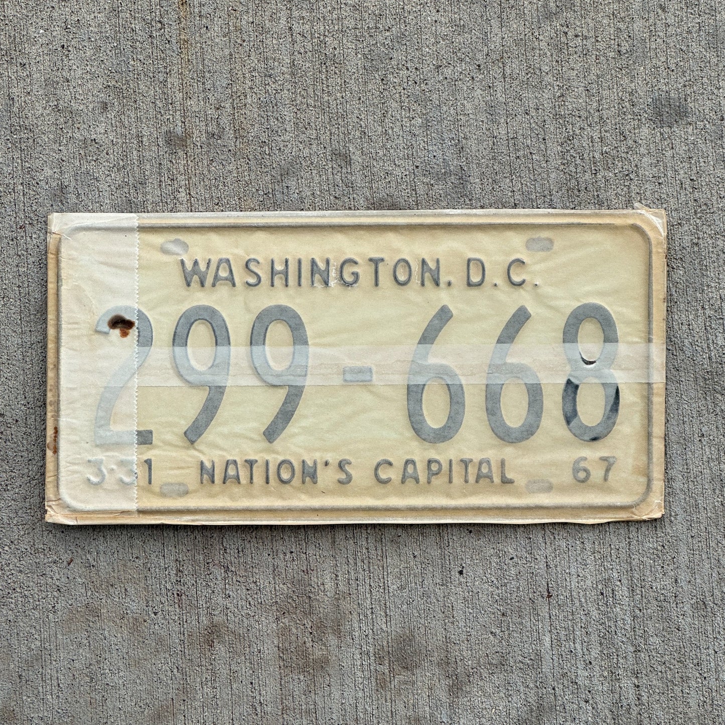 Photo of a 1967 1968 Washington DC License Plate Pair Auto Tag Garage Decor Vintage with Envelope 299 668 with original patina