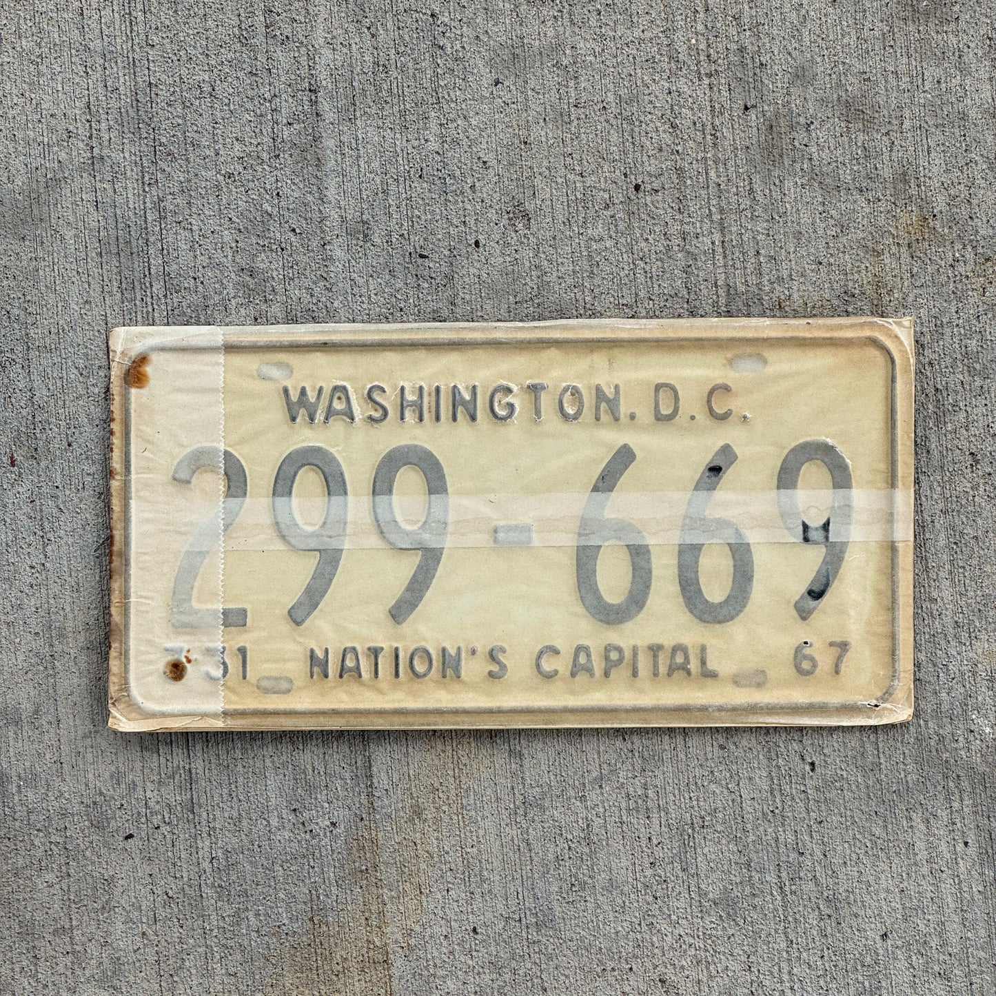 Photo of a 1967 1968 Washington DC License Plate Pair Auto Tag Garage Decor Vintage with Envelope 299 669 with original patina