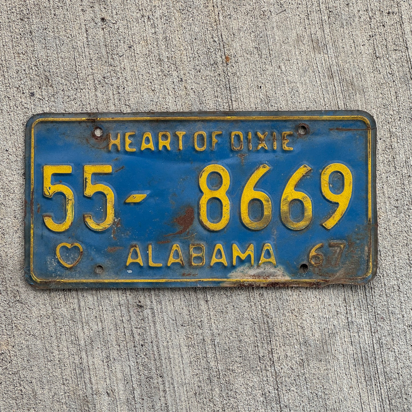 Photo of a 1967 Alabama License Plate Auto Tag Garage Decor Vintage 55 8669 with original patina