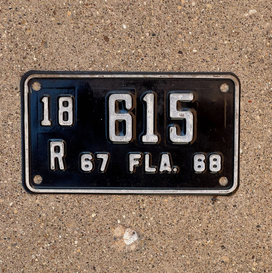 Photo of a 1967 Florida Motorcycle License Plate Auto Tag Garage Decor Vintage Lee County 3 Digit 18 R 615 with original patina