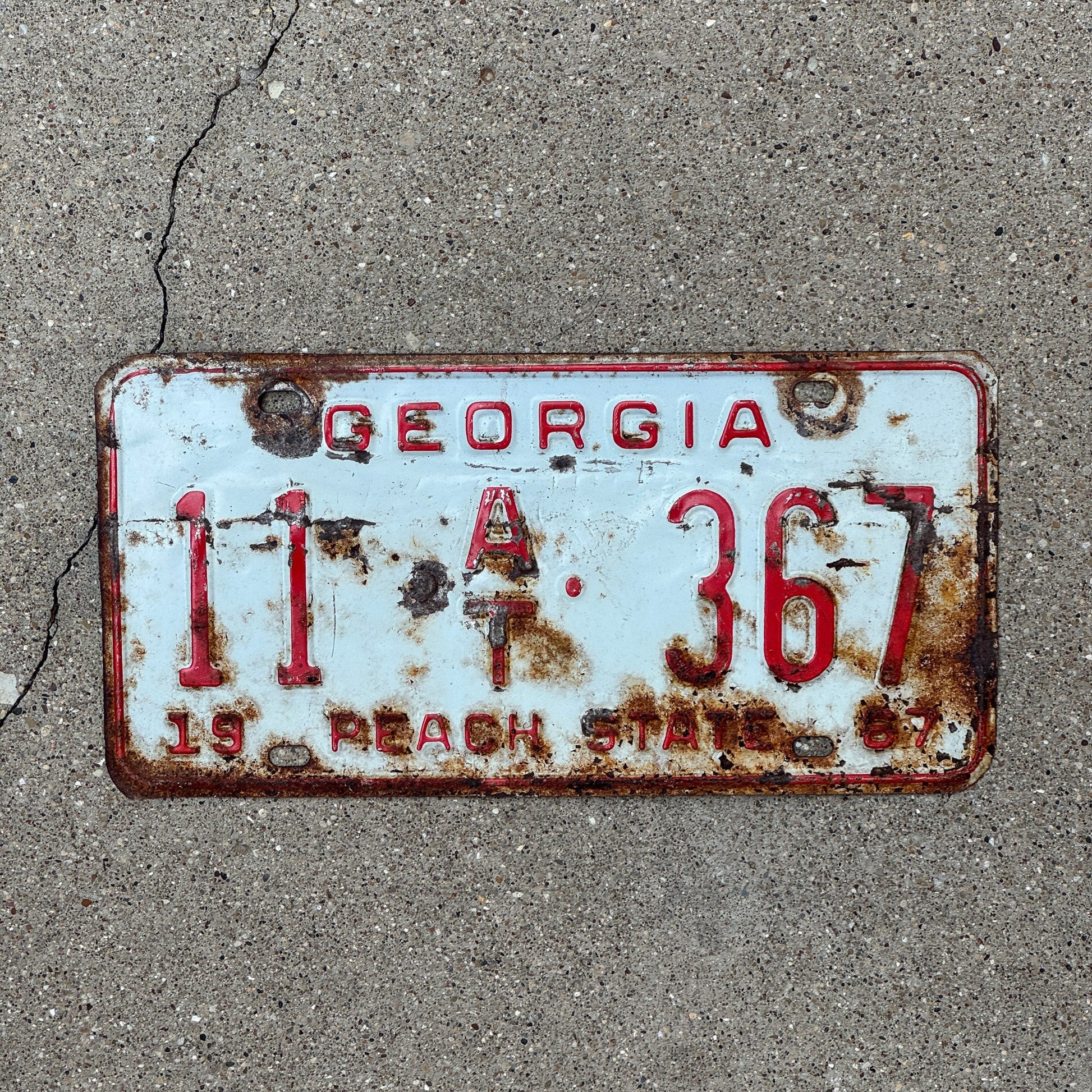 Photo of a 1967 Georgia Trailer License Plate Auto Tag Garage Decor Vintage Peach State 11 AT 367