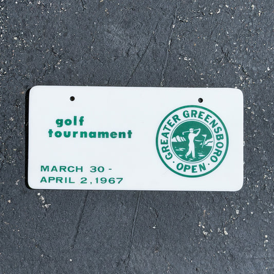 Photo of a 1967 Greater Greensboro Open North Carolina Booster License Plate Auto Tag Garage Decor Vintage
 Golf Tournament Plastic with original patina