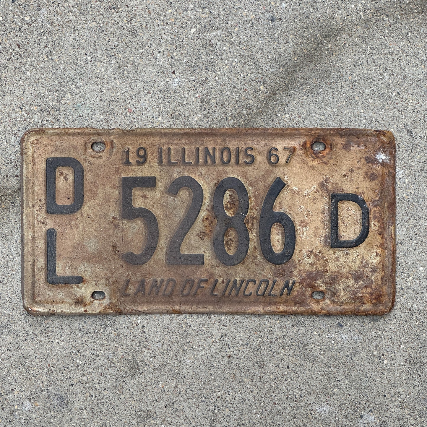 Photo of a 1967 Illinois Dealer License Plate Auto Tag 1 Vintage Garage 5286 D with original patina