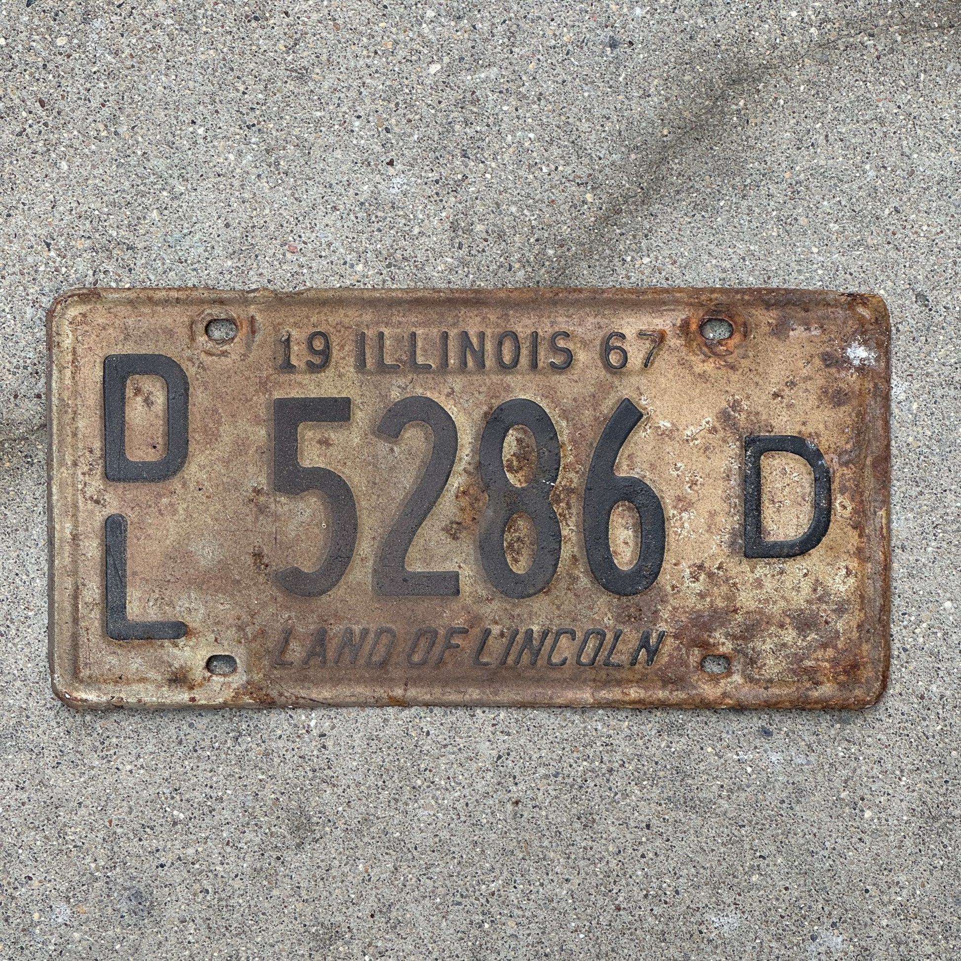 Photo of a 1967 Illinois Dealer License Plate Auto Tag 1 Vintage Garage 5286 D with original patina