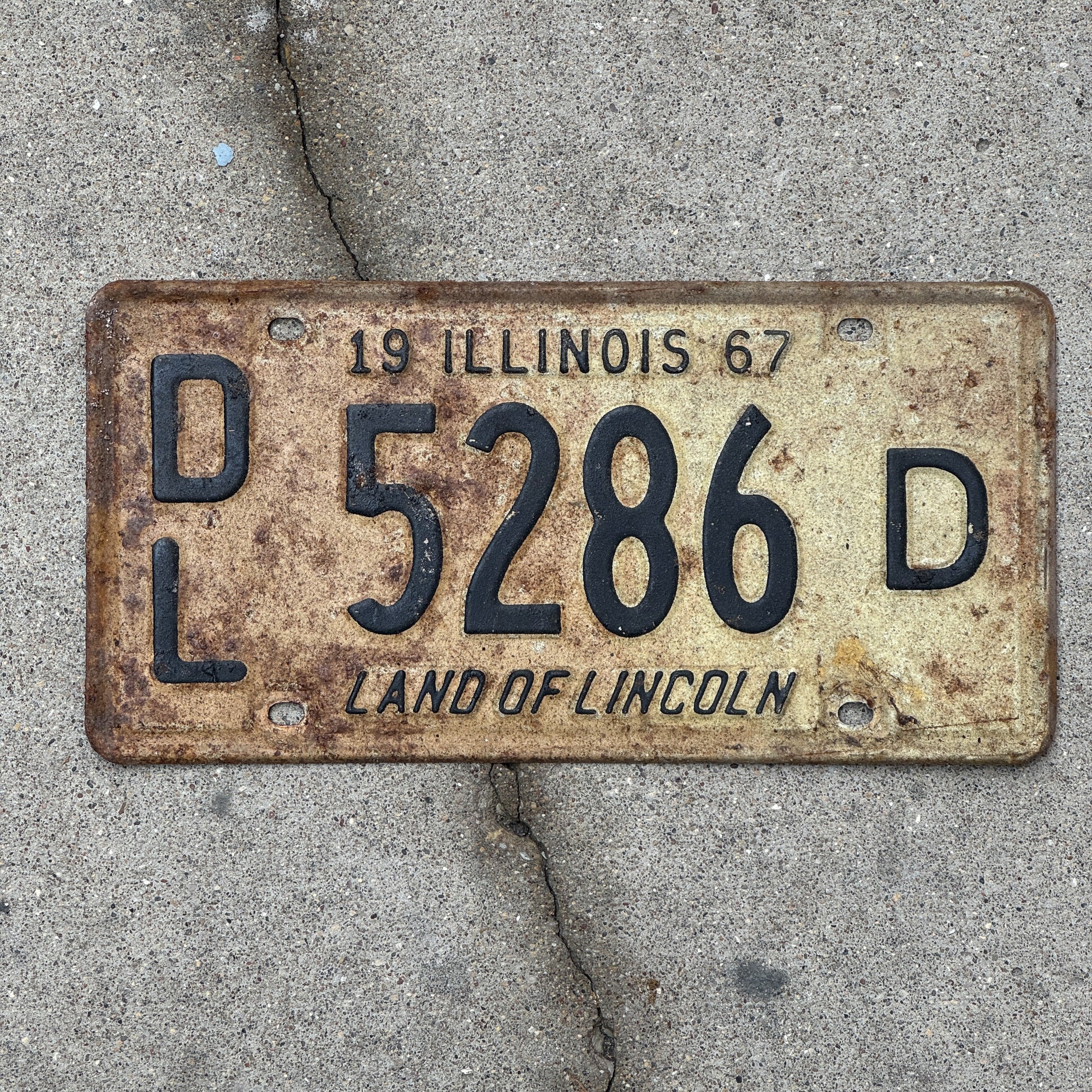 Photo of a 1967 Illinois Dealer License Plate Auto Tag 2 Vintage Garage 5286 D with original patina