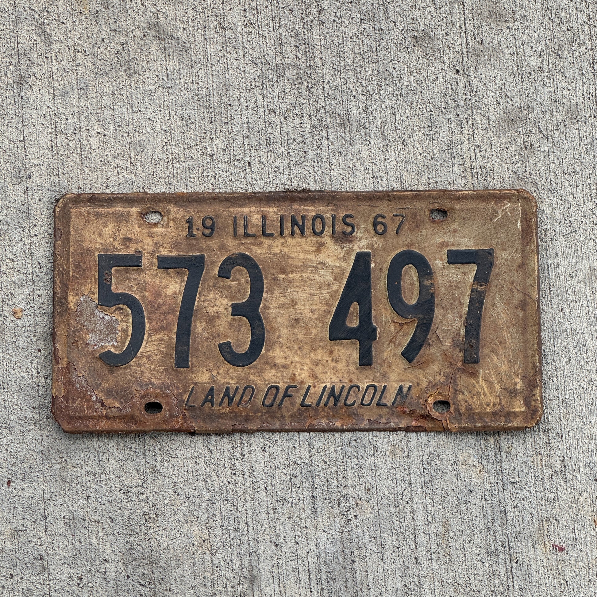 Photo of a 1967 Illinois License Plate Auto Tag 1 Vintage Garage 573 497 with original patina
