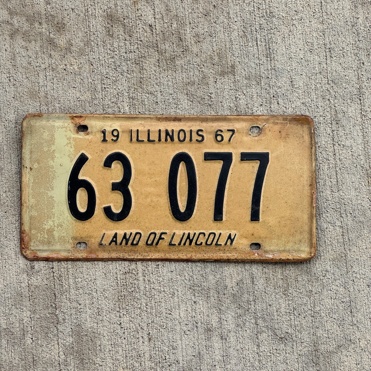Photo of a 1967 Illinois License Plate Auto Tag 1 Vintage Garage 63 077 with original patina