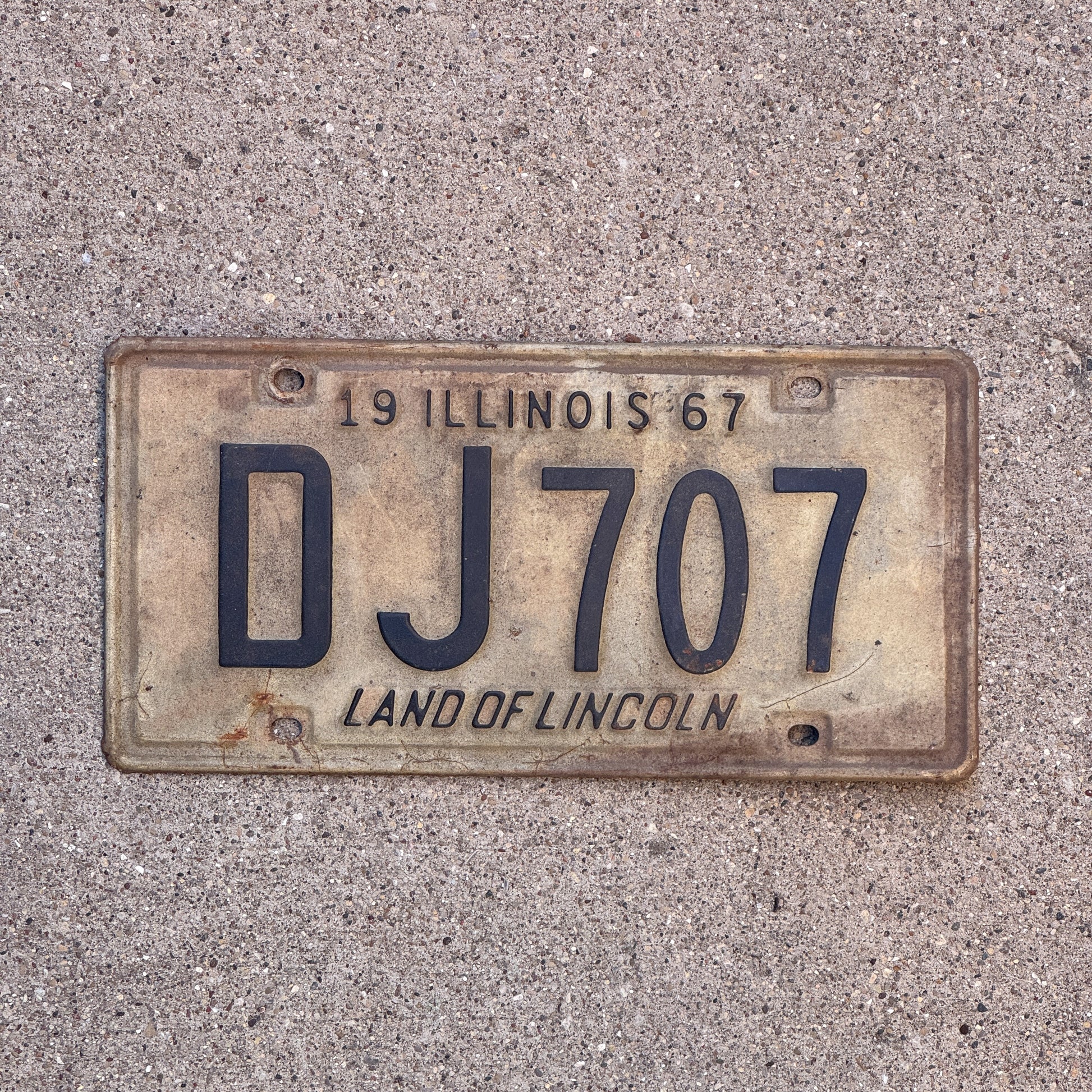 Photo of a 1967 Illinois License Plate Auto Tag 1 Vintage Garage DJ 707 with original patina