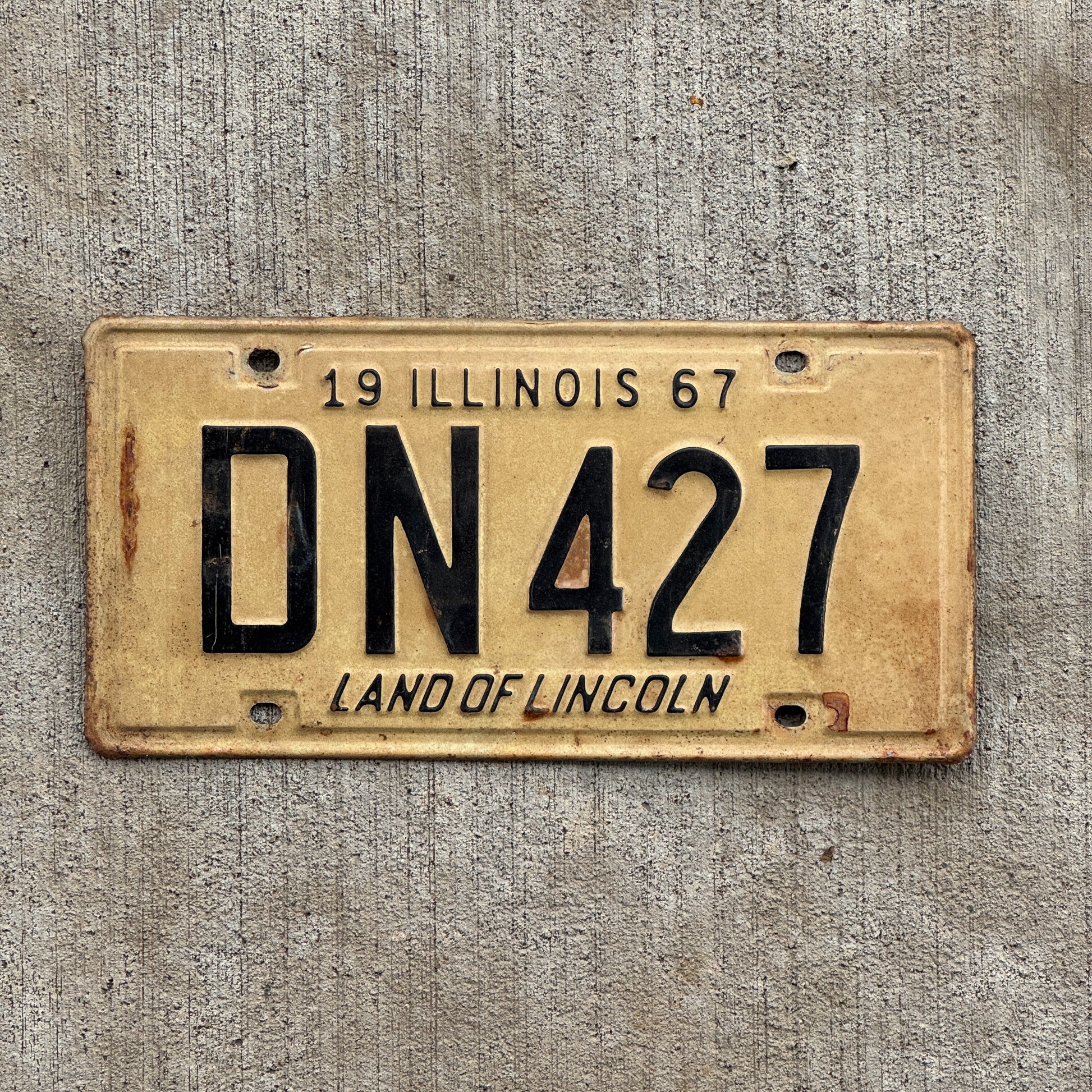 Photo of a 1967 Illinois License Plate Auto Tag 1 Vintage Garage DN 427 with original patina