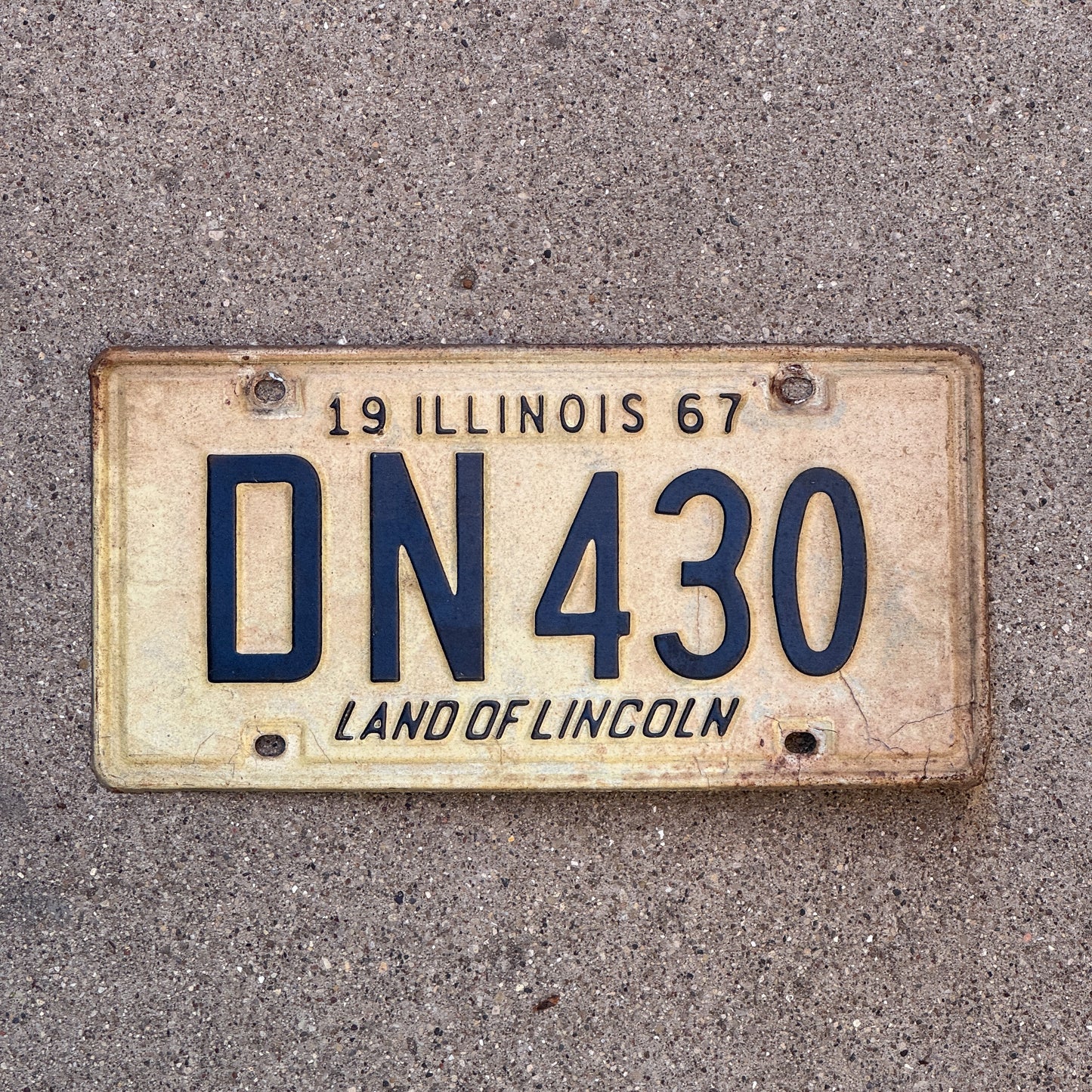 Photo of a 1967 Illinois License Plate Auto Tag 1 Vintage Garage DN 430 with original patina
