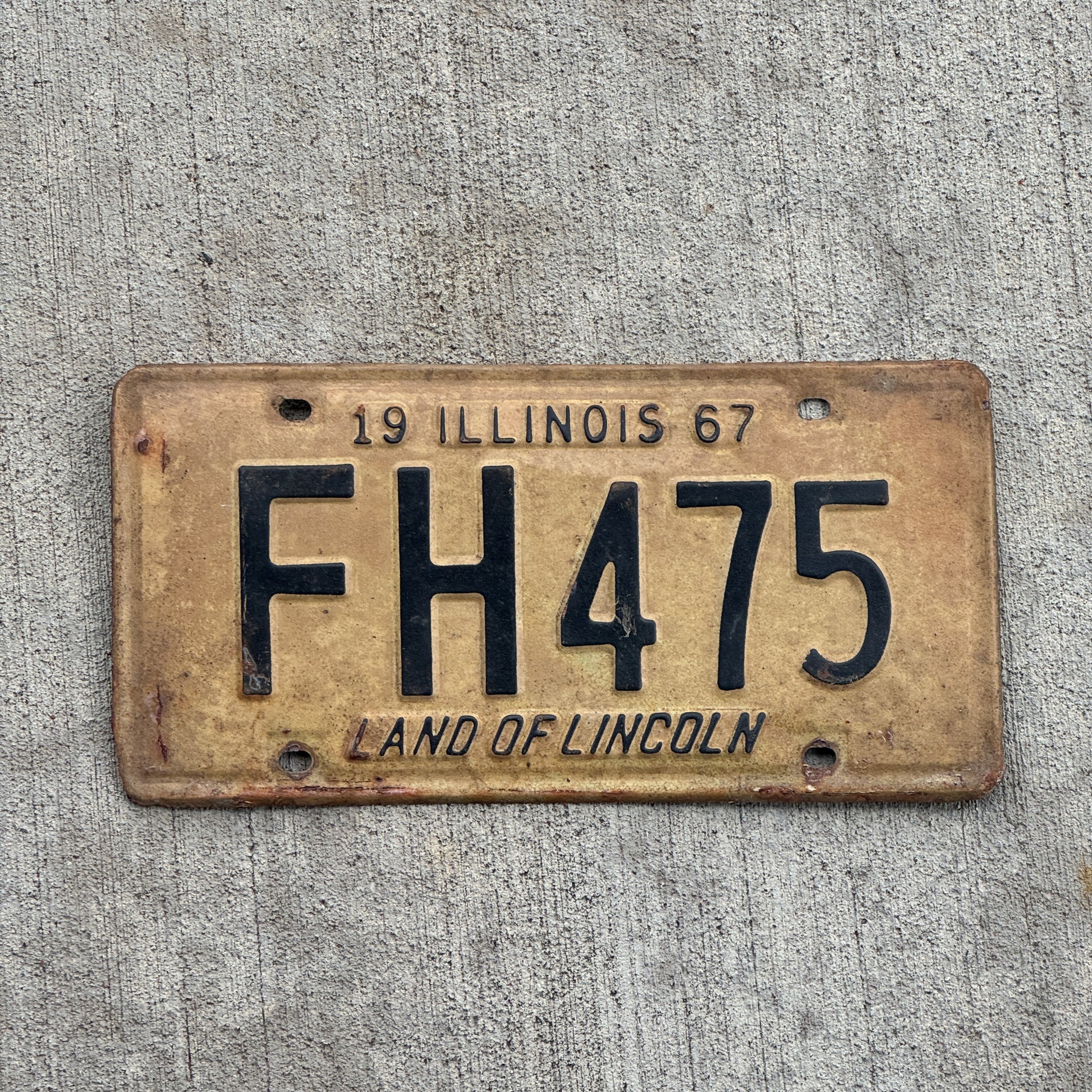 Photo of a 1967 Illinois License Plate Auto Tag 1 Vintage Garage FH 475 with original patina