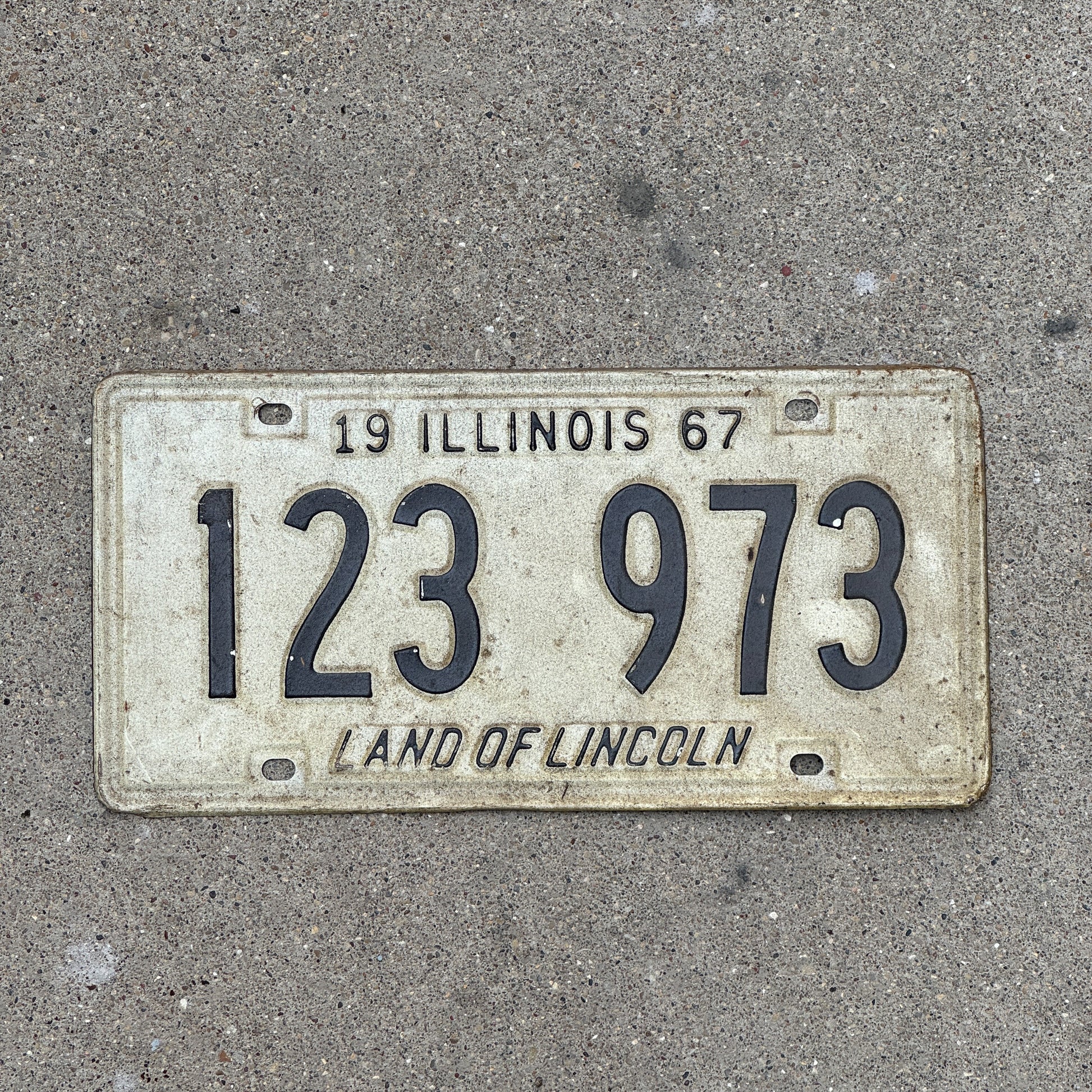 Photo of a 1967 Illinois License Plate Auto Tag 2 Vintage Garage 123 973 with original patina