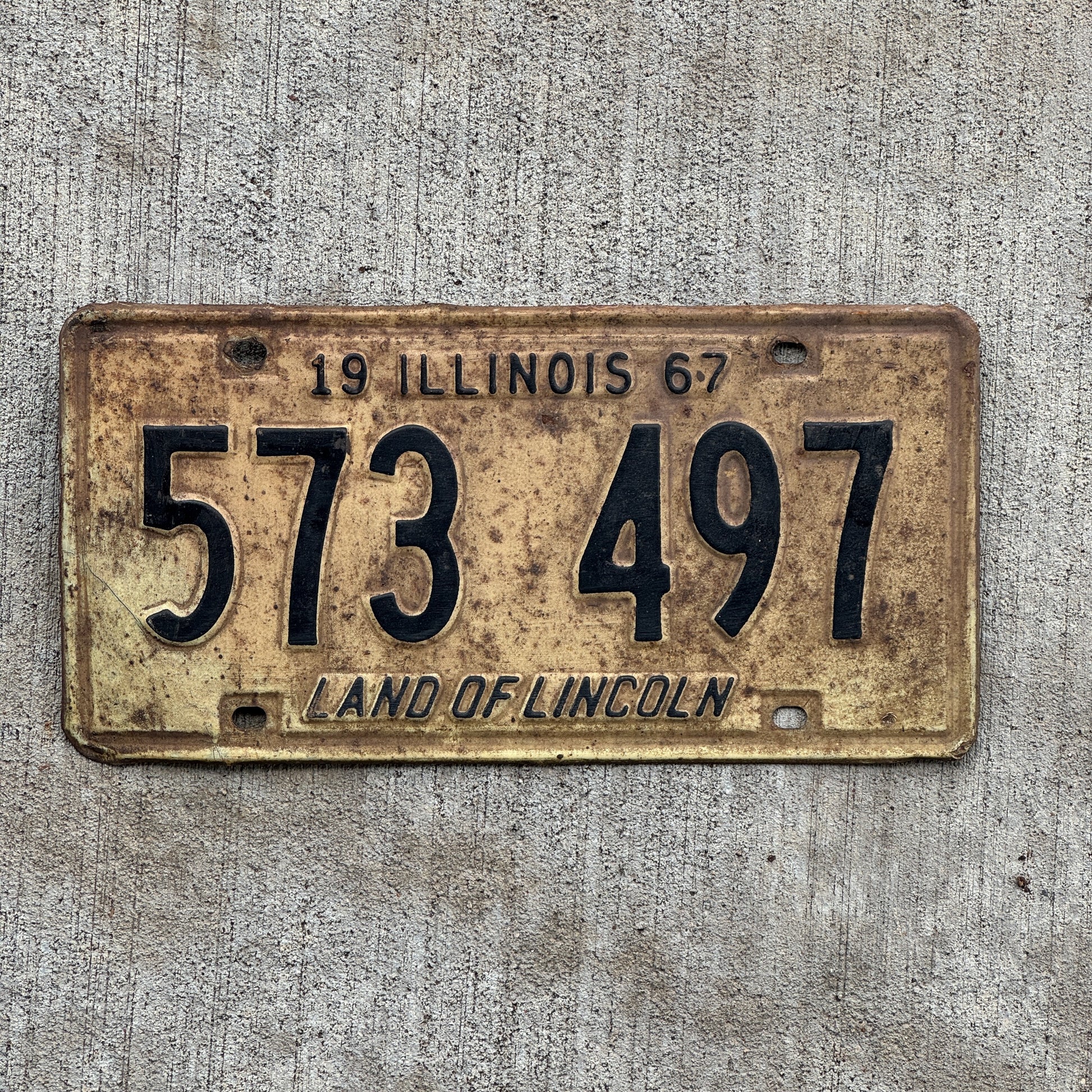Photo of a 1967 Illinois License Plate Auto Tag 2 Vintage Garage 573 497 with original patina