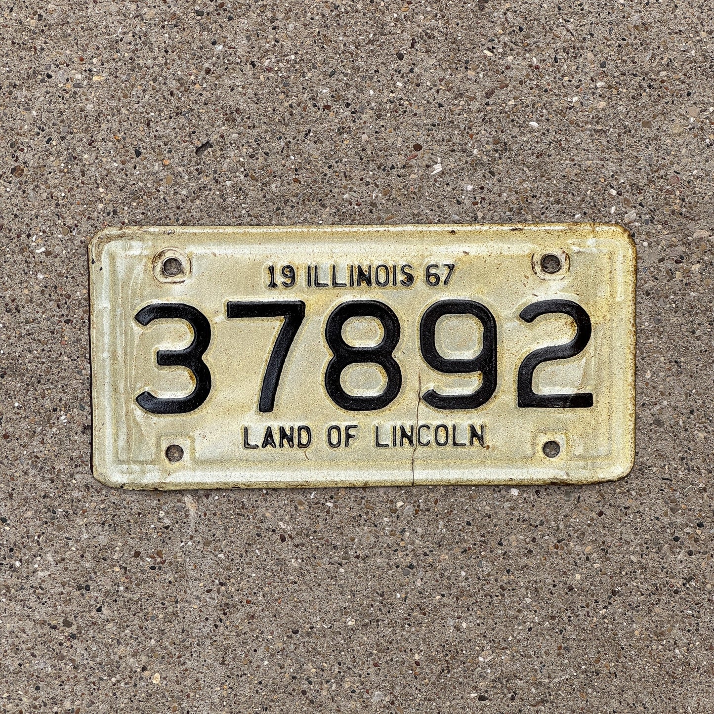 Photo of a 1967 Illinois Motorcycle License Plate Auto Tag Garage Decor Vintage 37892