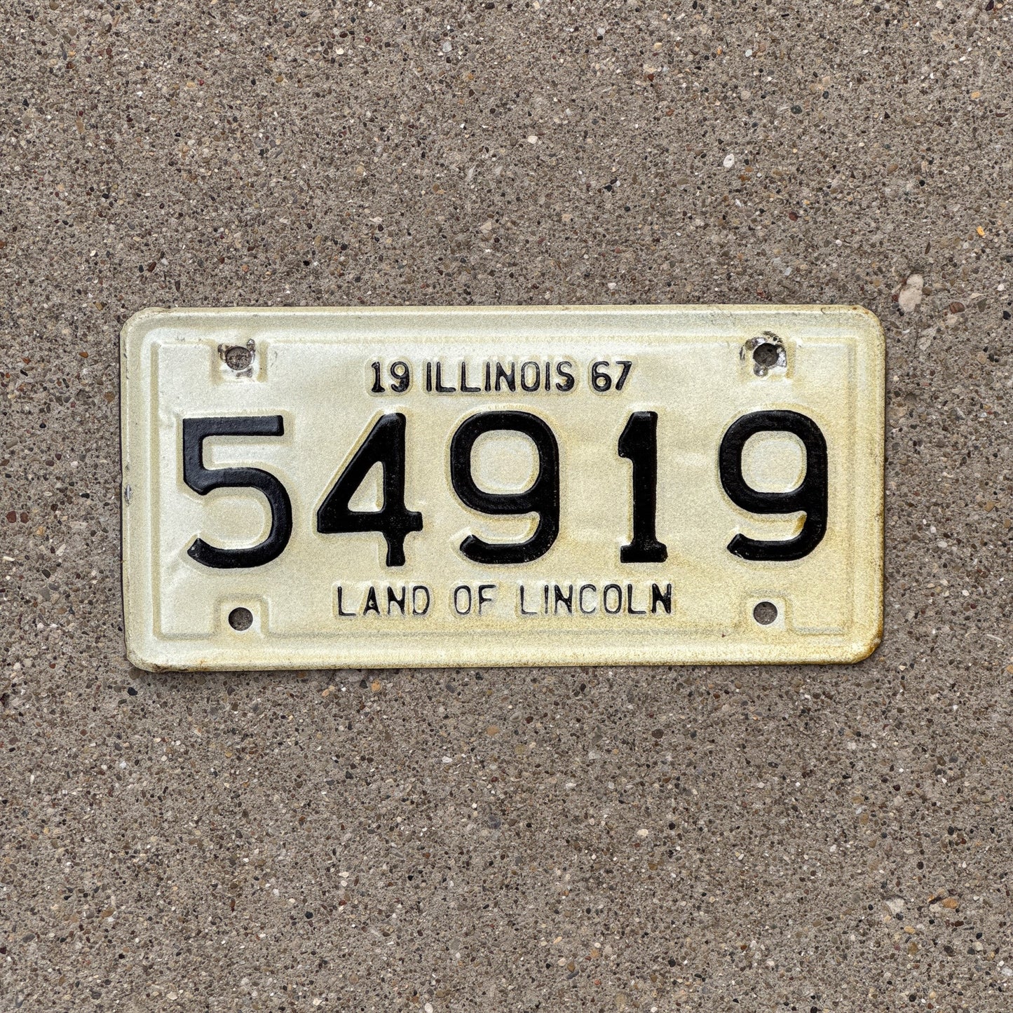 Photo of a 1967 Illinois Motorcycle License Plate Auto Tag Garage Decor Vintage 54919