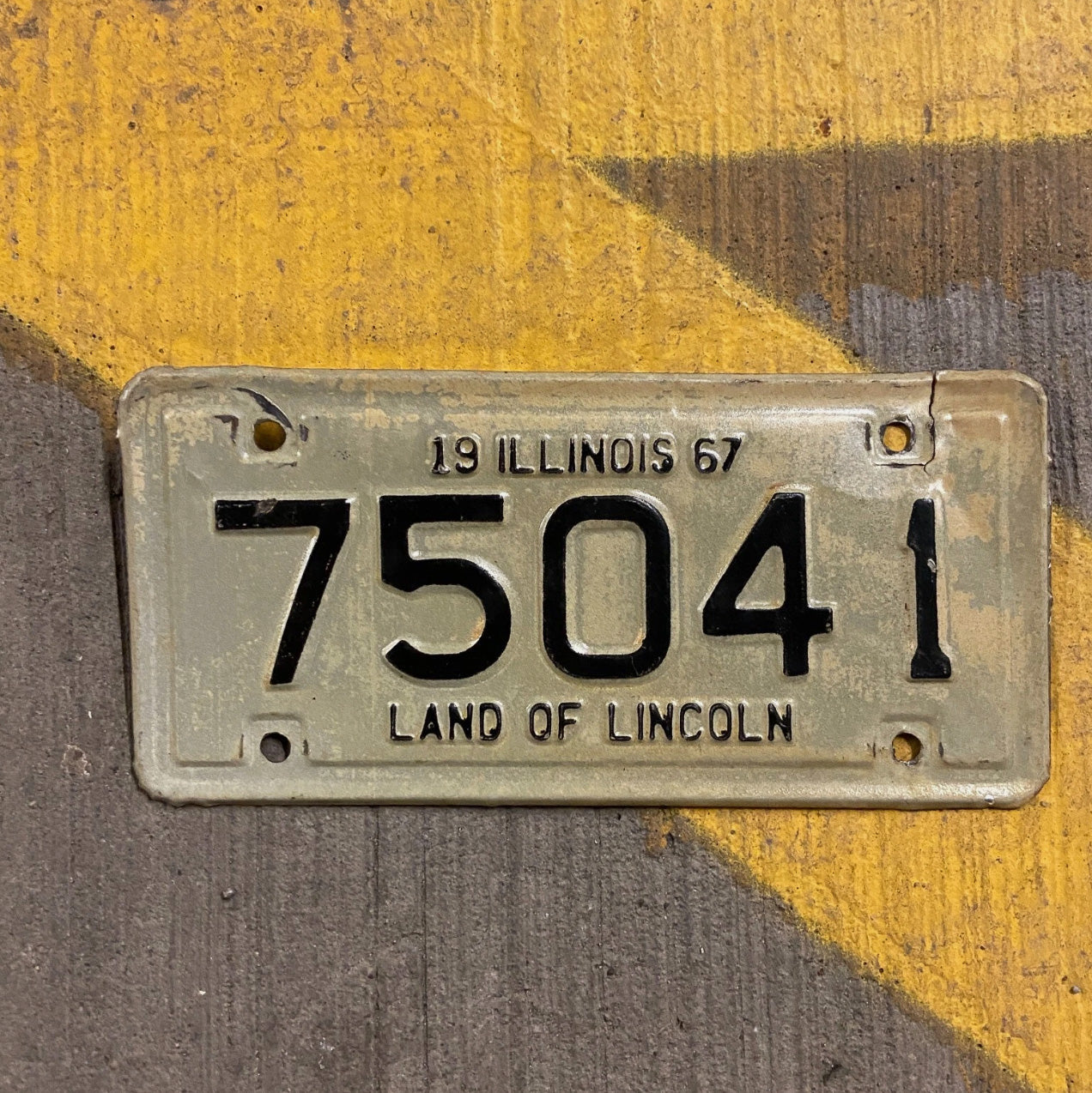 Photo of a 1967 Illinois Motorcycle License Plate Auto Tag Garage Decor Vintage 75041 with original patina