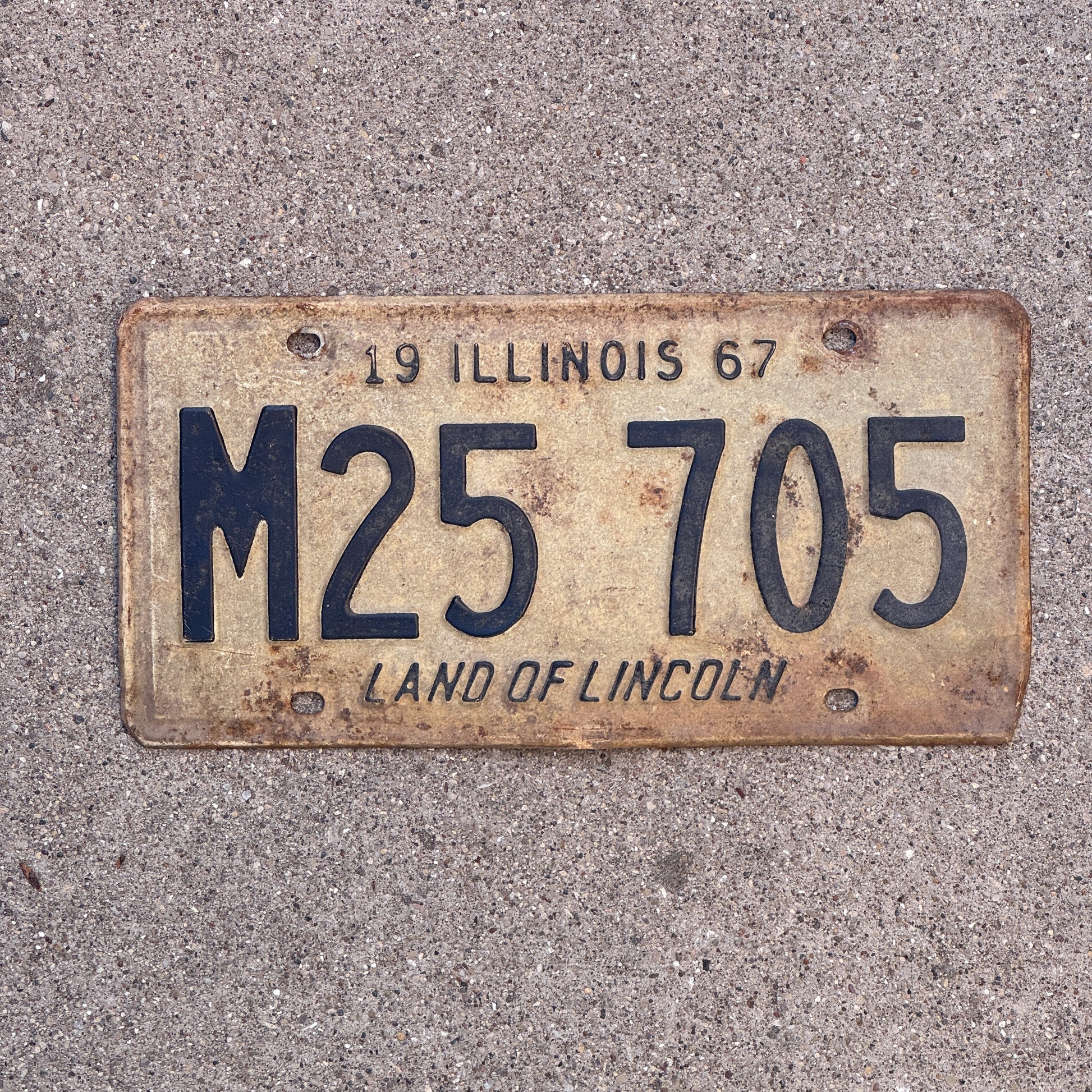 Photo of a 1967 Illinois Municipal License Plate Auto Tag 2 Vintage Garage M 25 705 with original patina