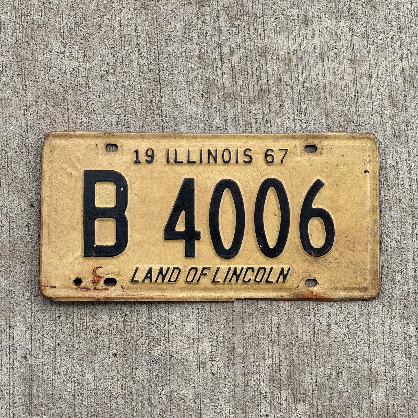 Photo of a 1967 Illinois Truck License Plate Auto Tag 1 Vintage Garage B 4006 with original patina