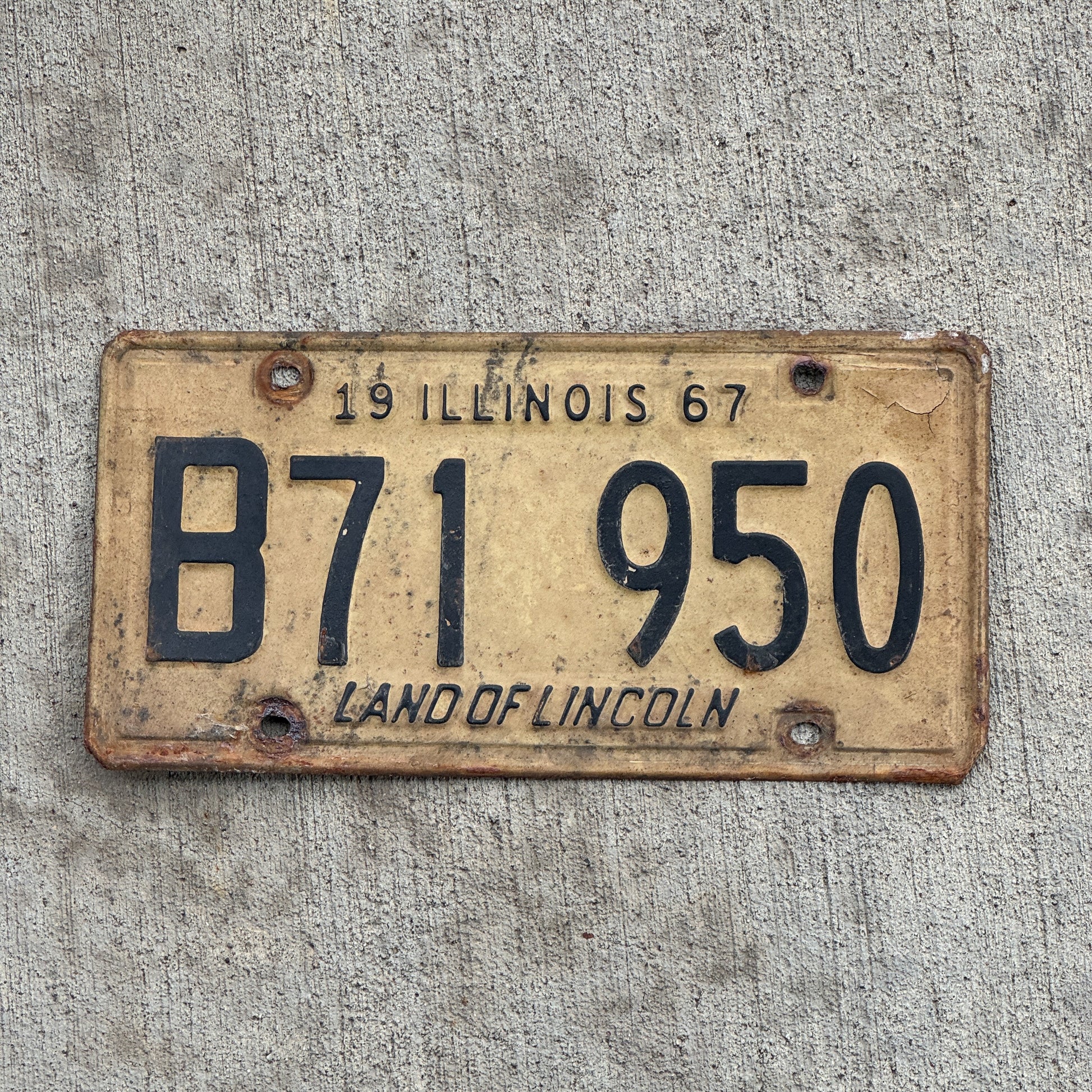 Photo of a 1967 Illinois Truck License Plate Auto Tag 1 Vintage Garage B 71 950 with original patina