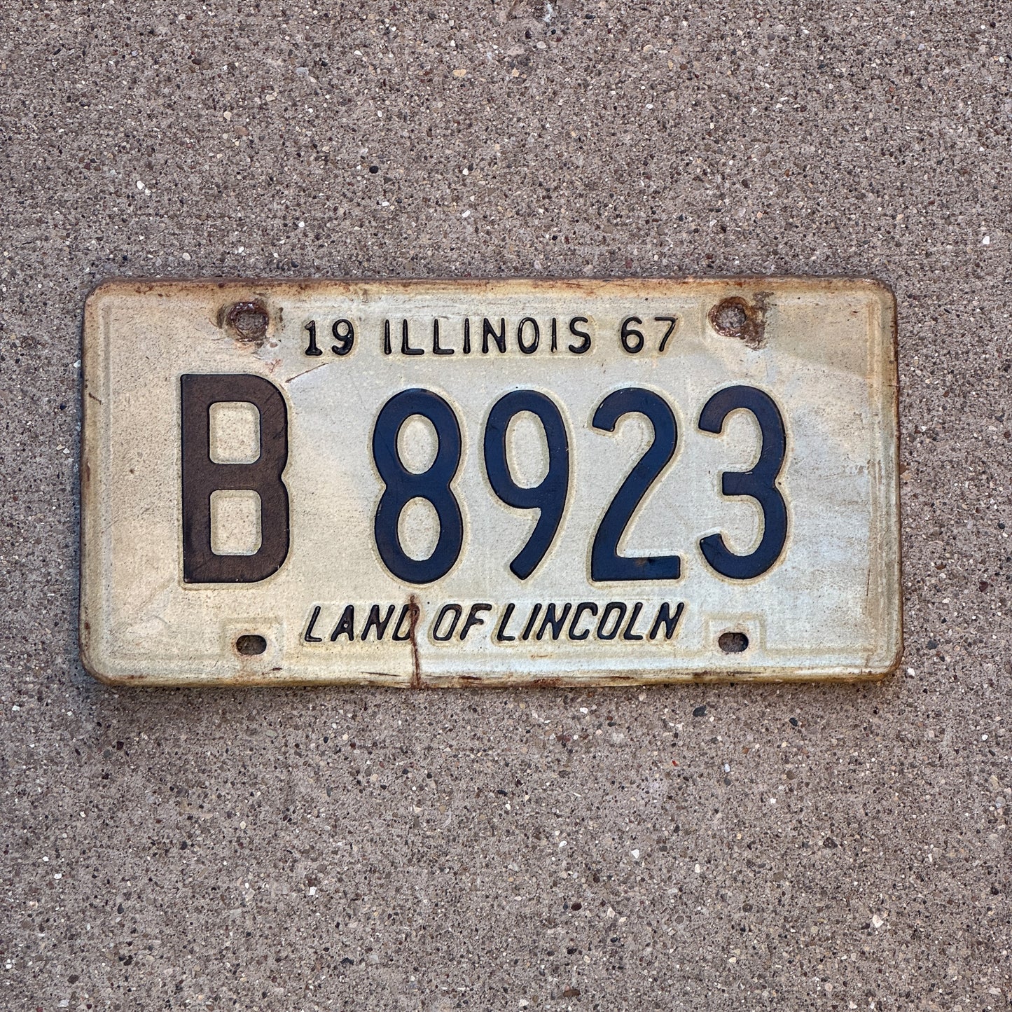 Photo of a 1967 Illinois Truck License Plate Auto Tag 1 Vintage Garage B 8923 with original patina