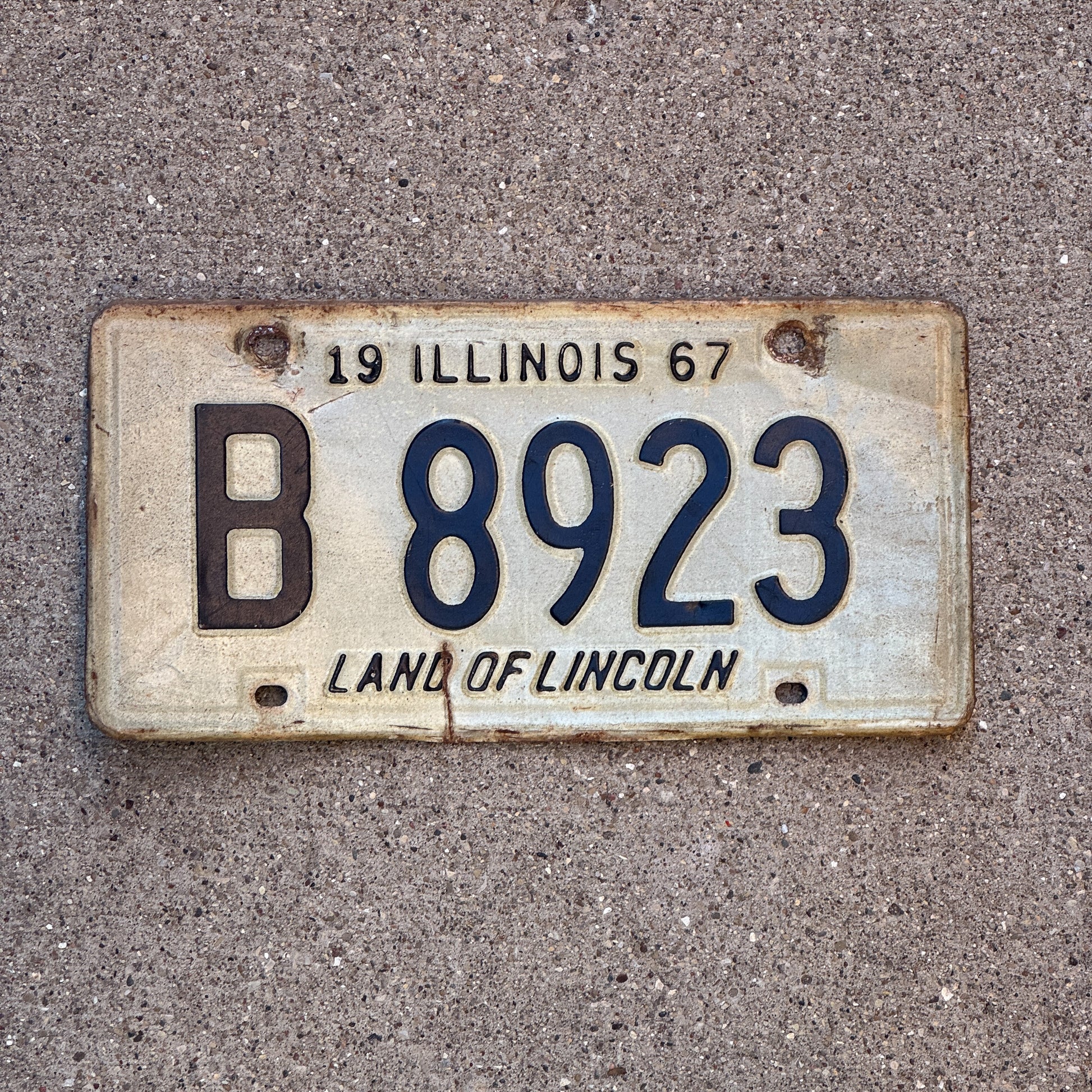 Photo of a 1967 Illinois Truck License Plate Auto Tag 1 Vintage Garage B 8923 with original patina