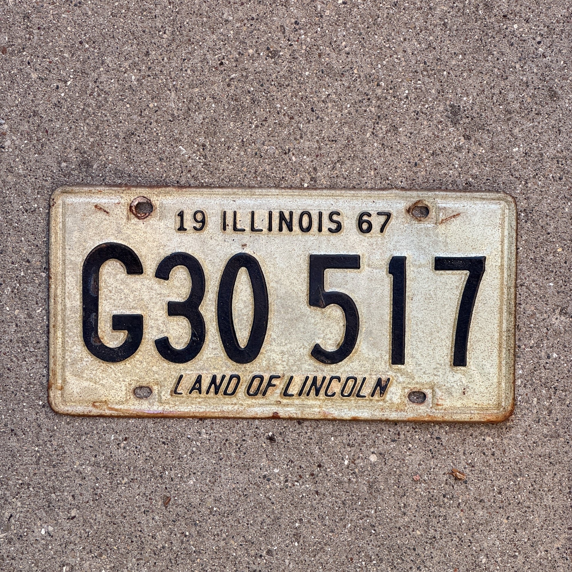 Photo of a 1967 Illinois Truck License Plate Auto Tag 1 Vintage Garage G 30 517 with original patina