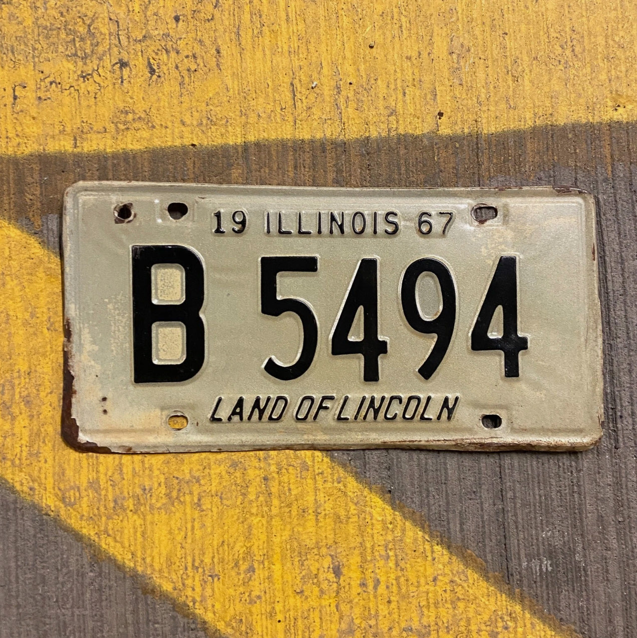 Photo of a 1967 Illinois Truck License Plate Auto Tag Garage Decor Vintage B 5494 with original patina