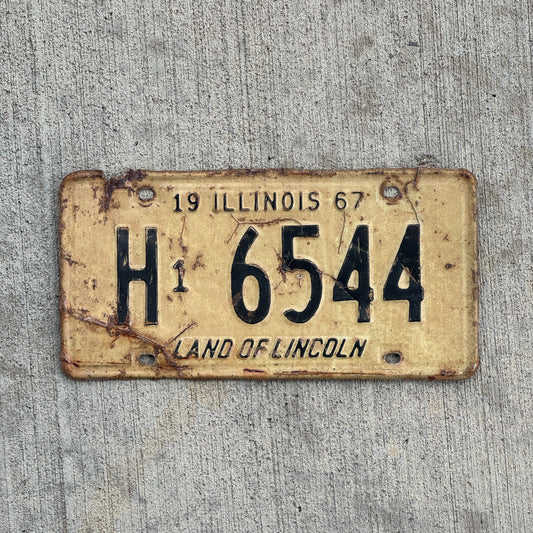 Photo of a 1967 Illinois Truck License Plate Auto Tag Garage Decor Vintage H1 6544 with original patina