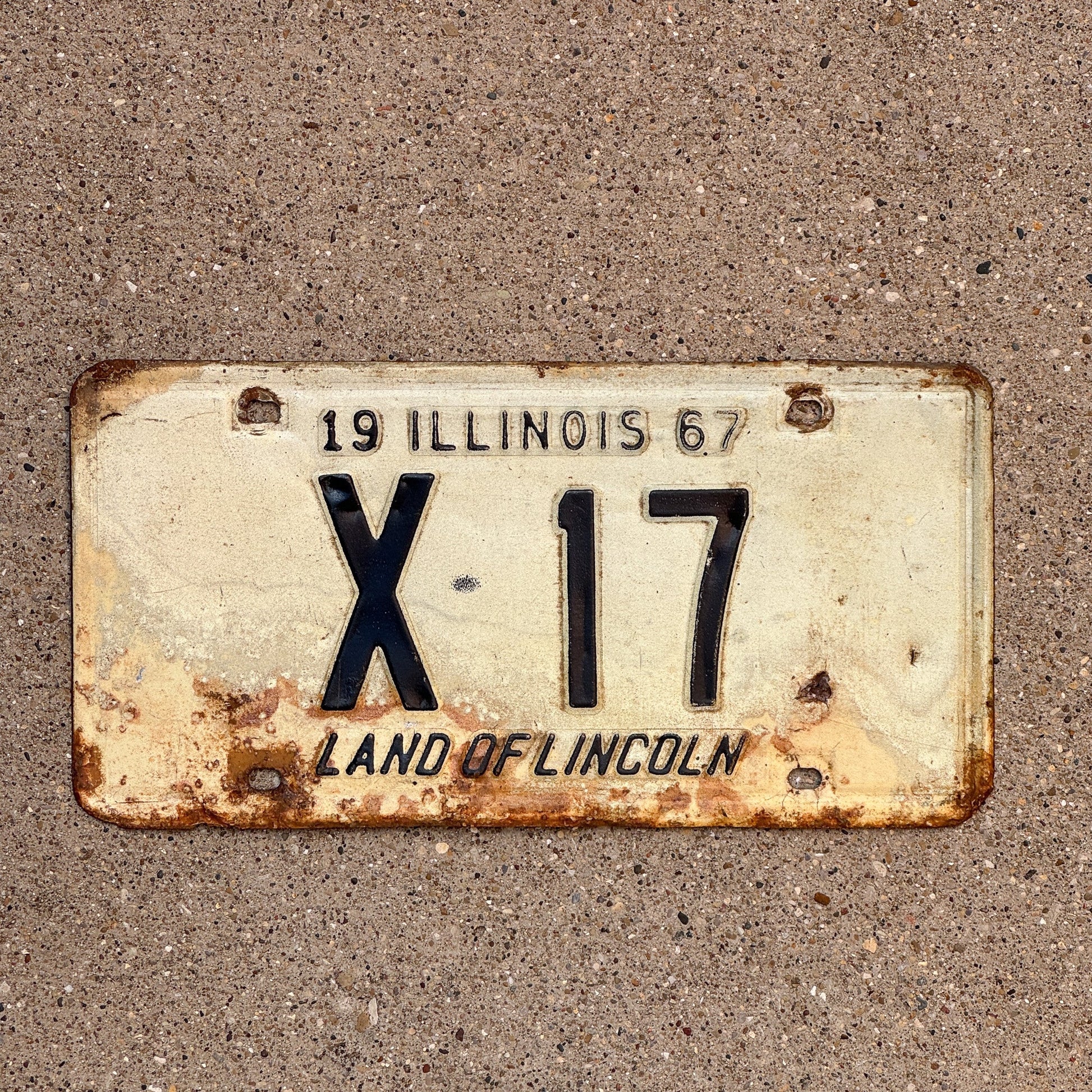 Photo of a 1967 Illinois Truck License Plate Auto Tag Garage Decor Vintage Low Number Two Digit X 17 with original patina