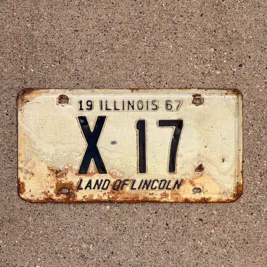 Photo of a 1967 Illinois Truck License Plate Auto Tag Garage Decor Vintage Low Number Two Digit X 17 with original patina
