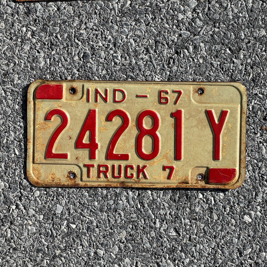 Photo of a 1967 Indiana Truck License Plate Auto Tag Garage Decor Vintage 24281Y