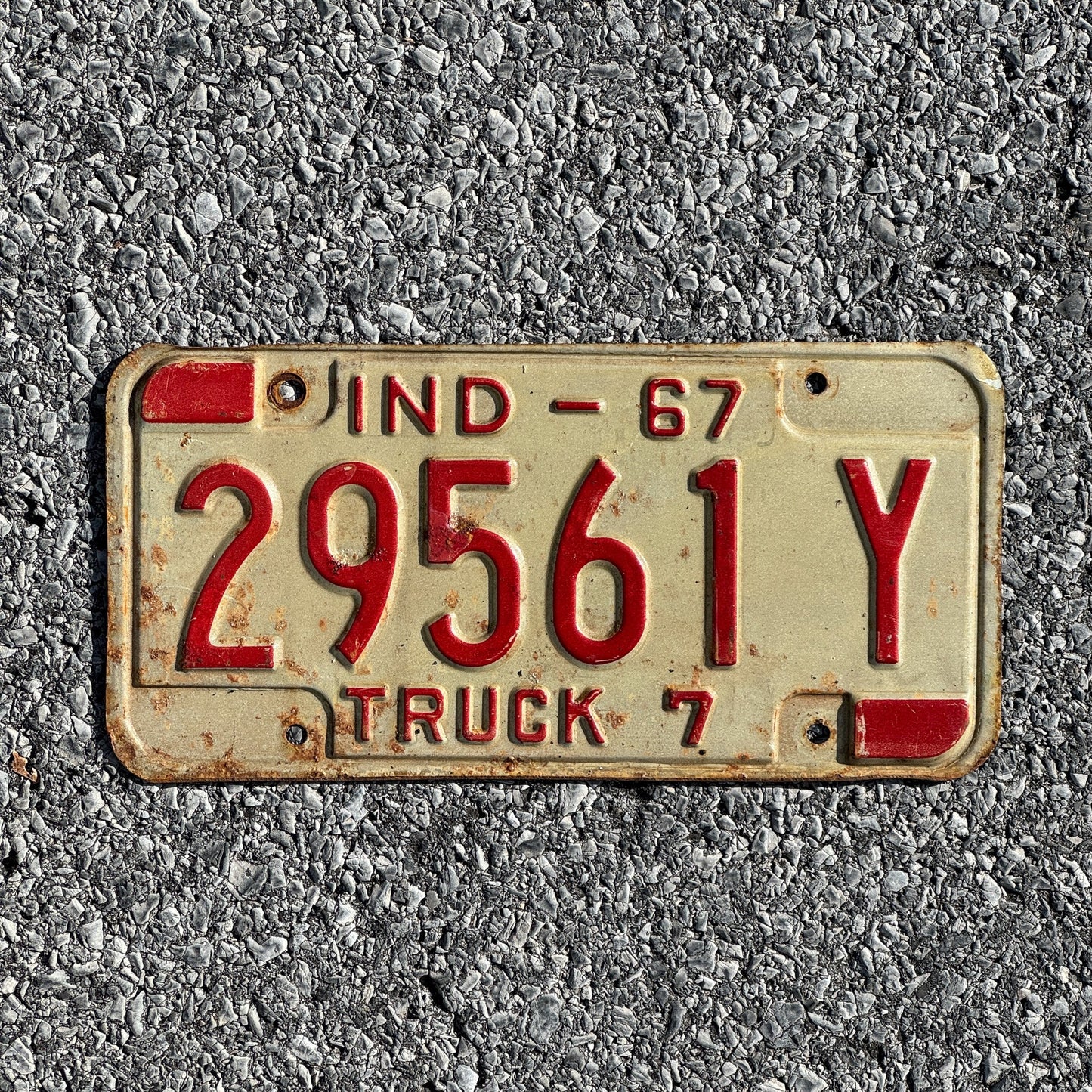 Photo of a 1967 Indiana Truck License Plate Auto Tag Garage Decor Vintage 29561Y